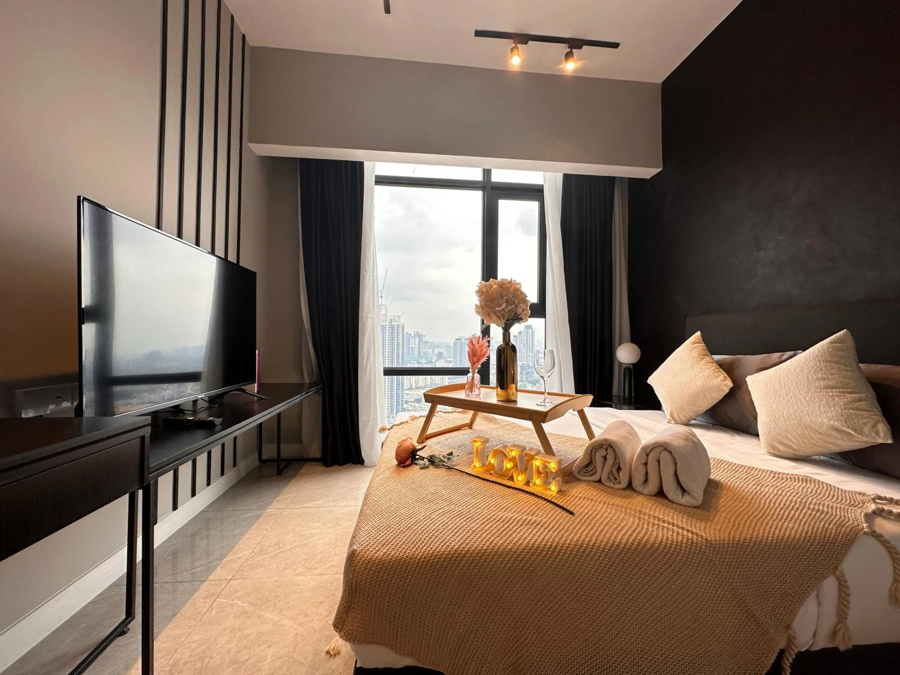 Communal lounge/ TV room, Bed in Axon Residence Bukit Bintang by Luna