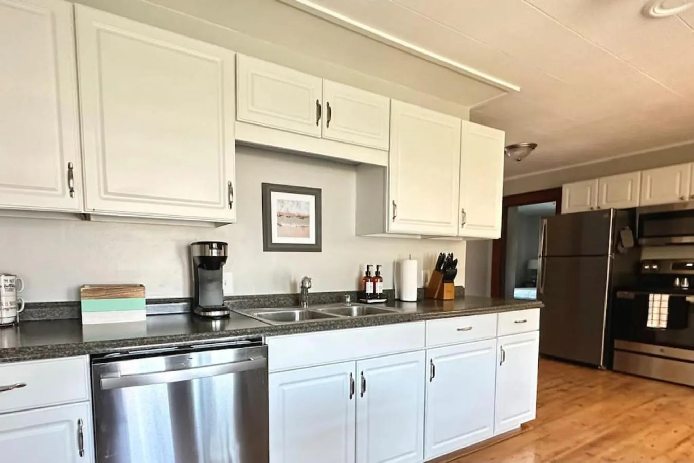Kitchen or kitchenette in 3 beds in Gorham direct trail access
