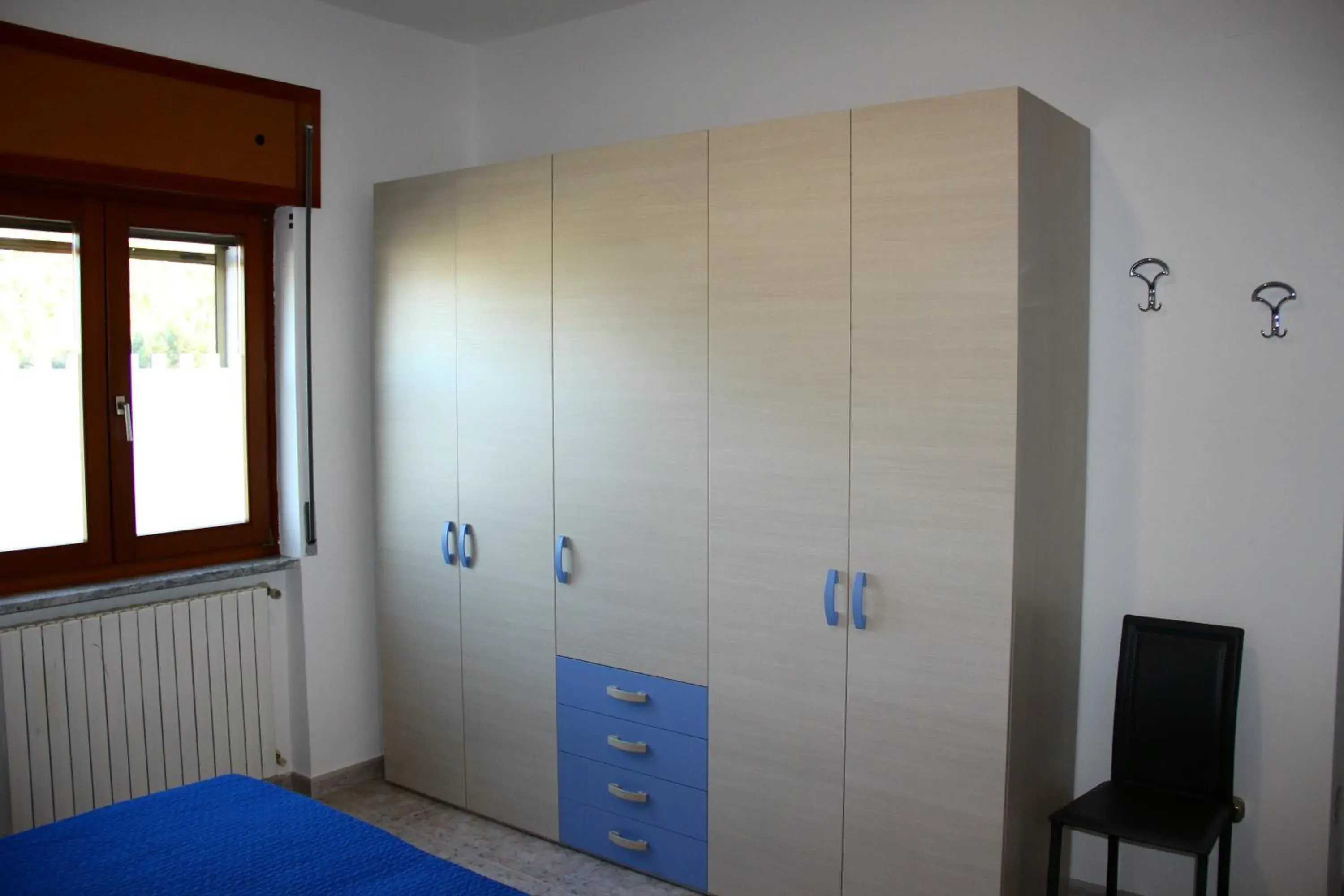 Basic Triple Room with Shared Bathroom - single occupancy in Lucantò Accommodations Basic Triple Room with Shared Bathroom - single occupancy in Lucantò Accommodations