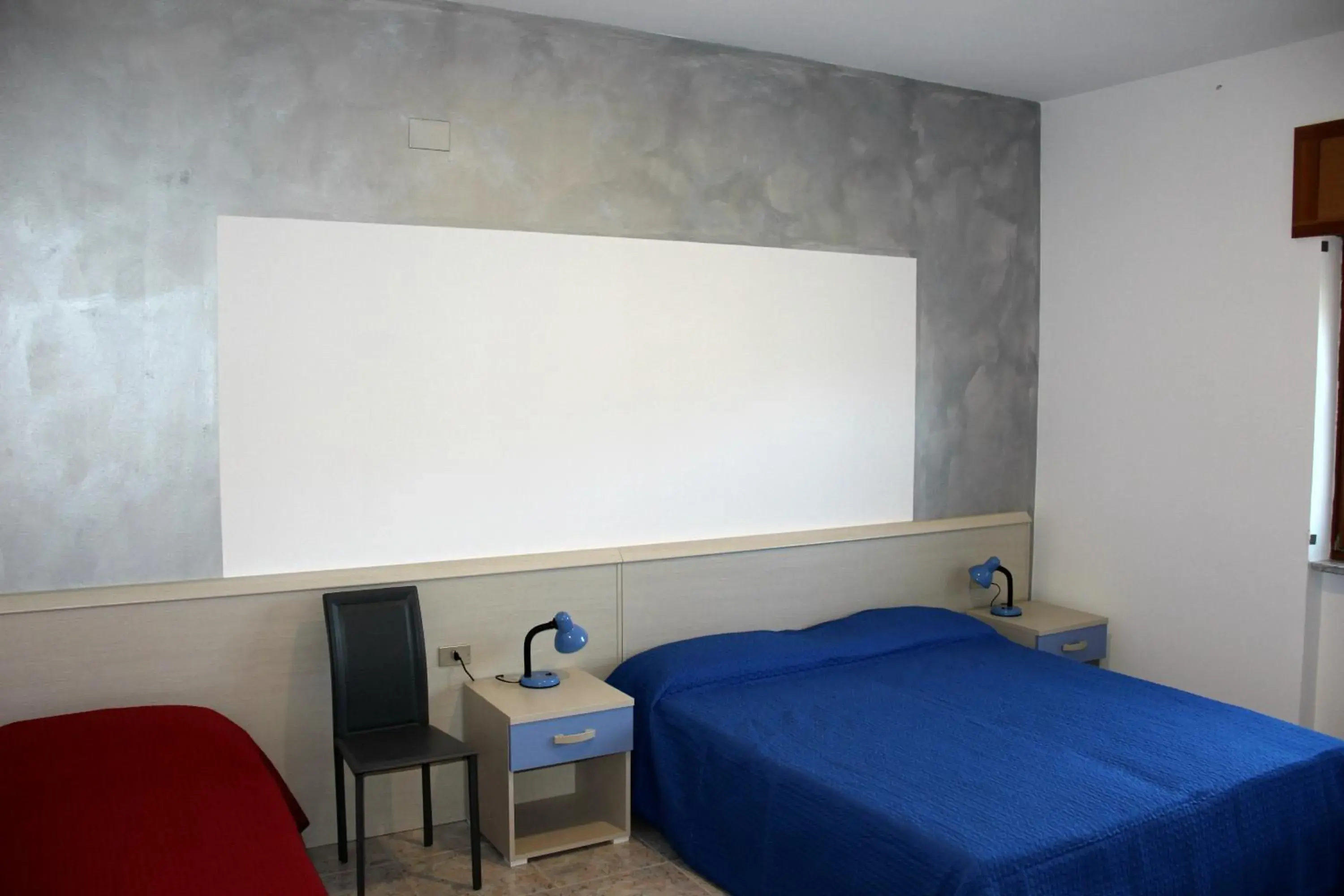 Basic Triple Room with Shared Bathroom - single occupancy in Lucantò Accommodations Basic Triple Room with Shared Bathroom - single occupancy in Lucantò Accommodations