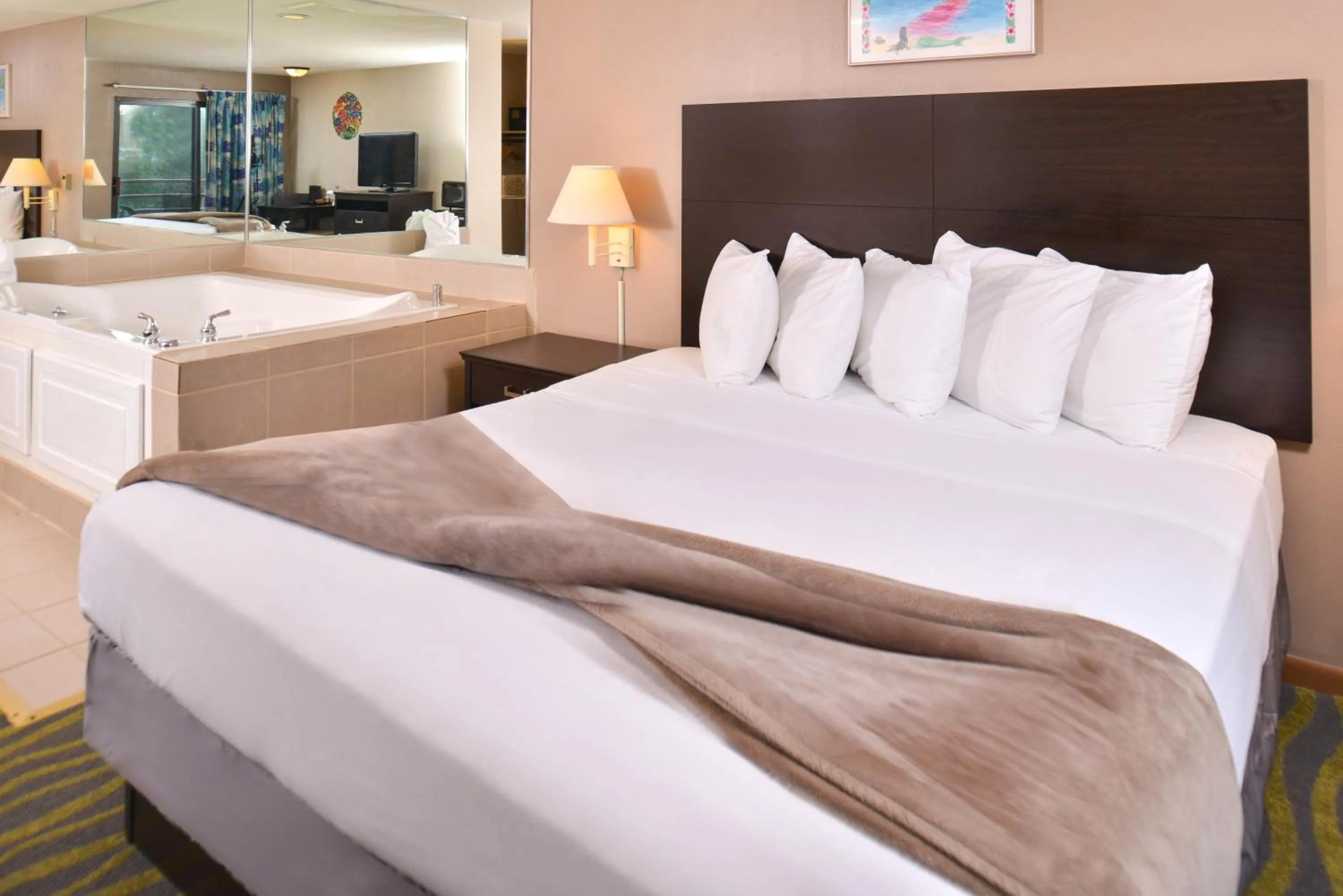 Hot Tub, Bed in Atlantis Family Waterpark Hotel, an Ascend Collection Hotel