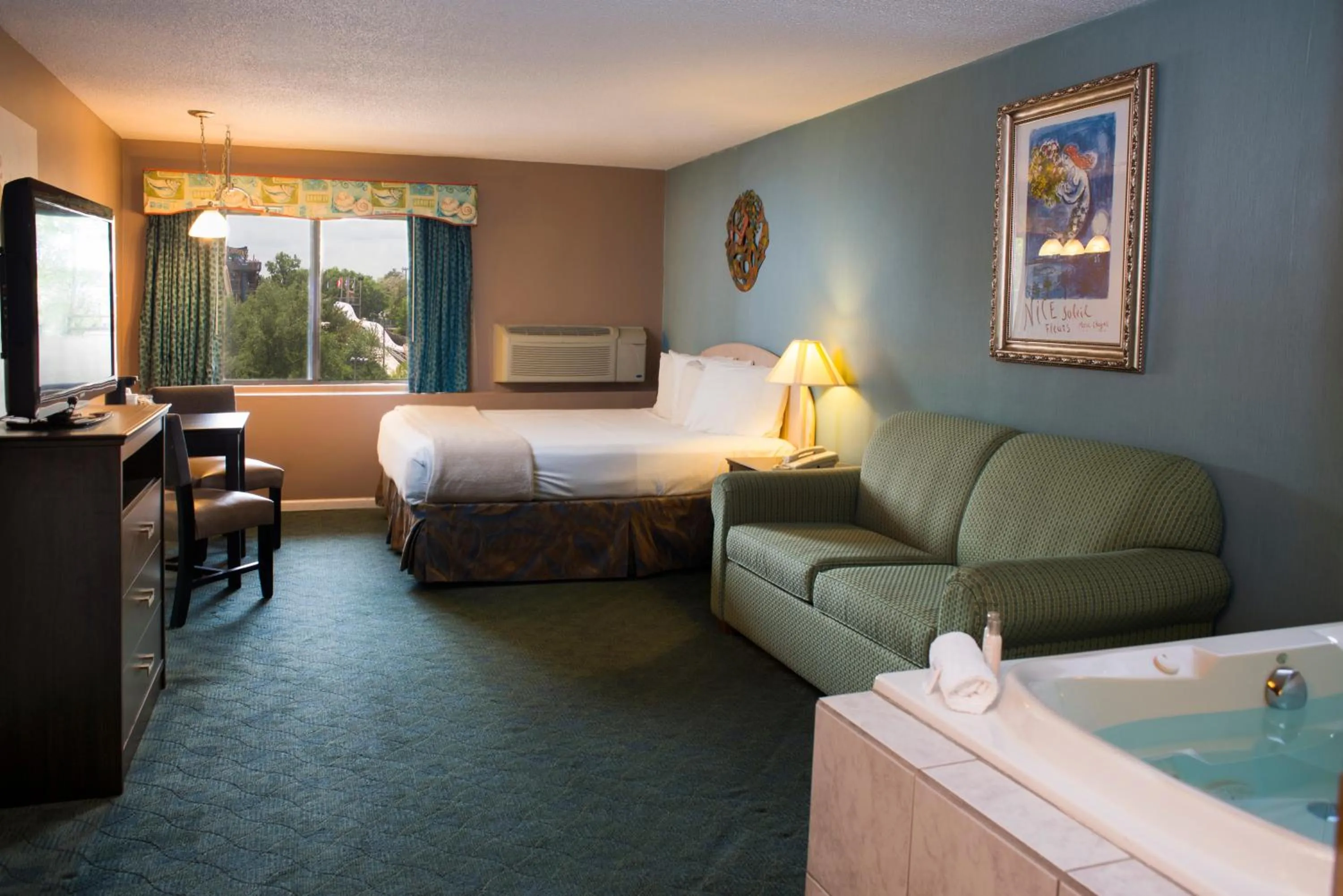 Bedroom, Bed in Atlantis Family Waterpark Hotel, an Ascend Collection Hotel