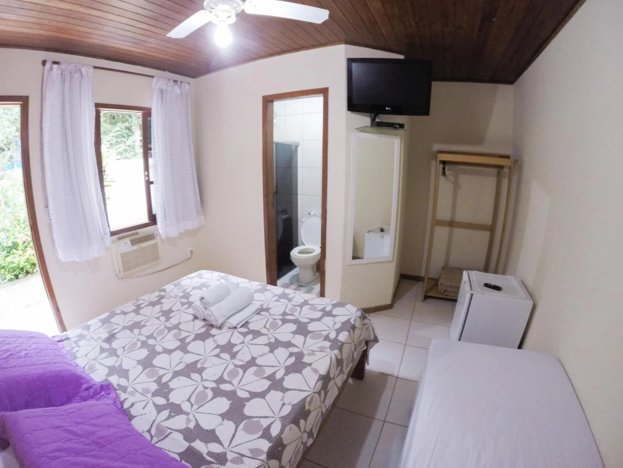 Bedroom, Bed in Pousada Recanto do Sabiá