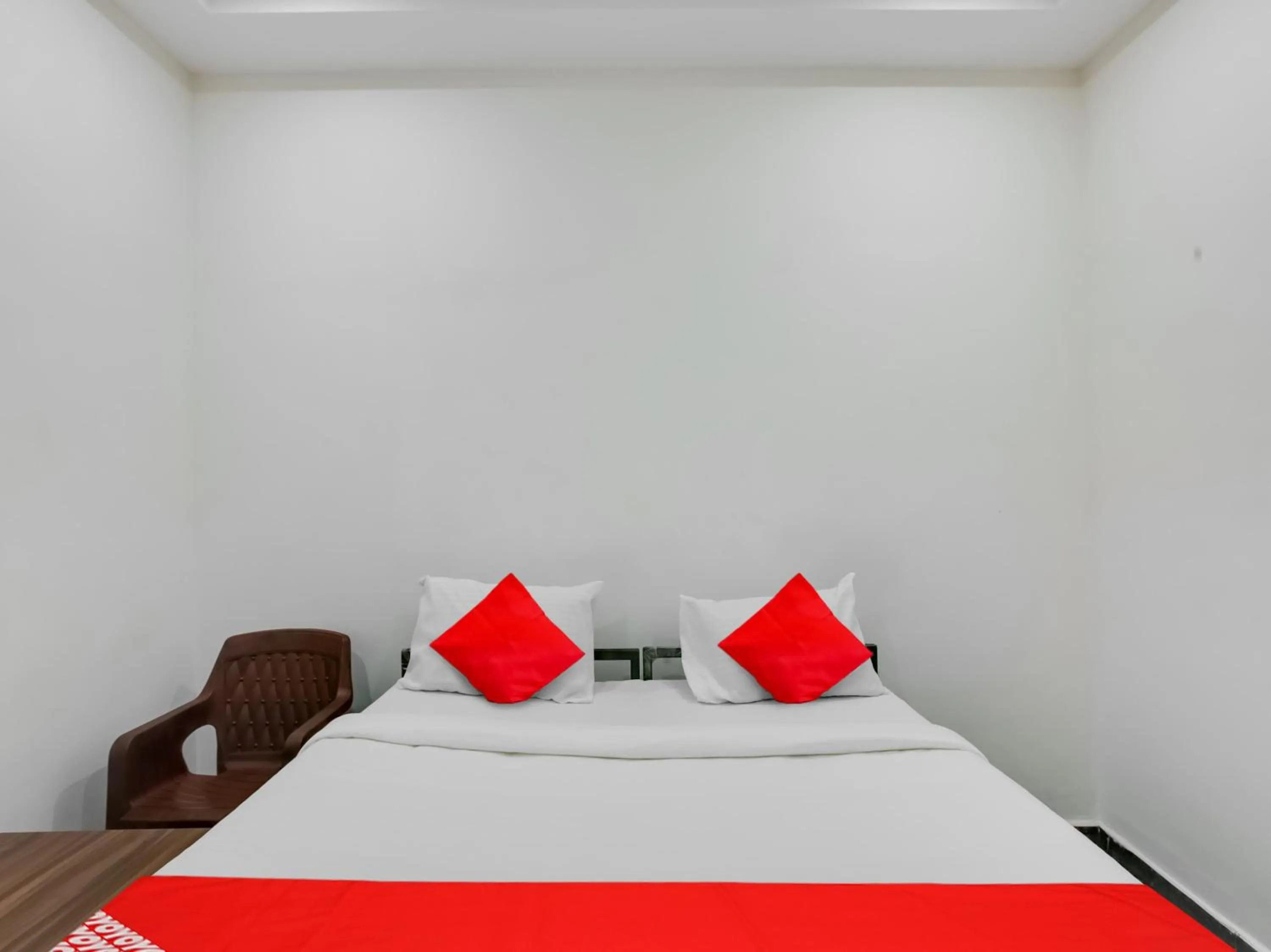 Bedroom, Bed in Hotel O Manjushree Boarding & Lodging nearby Dr.BR Ambedkar Stadium Basveshwar nagar