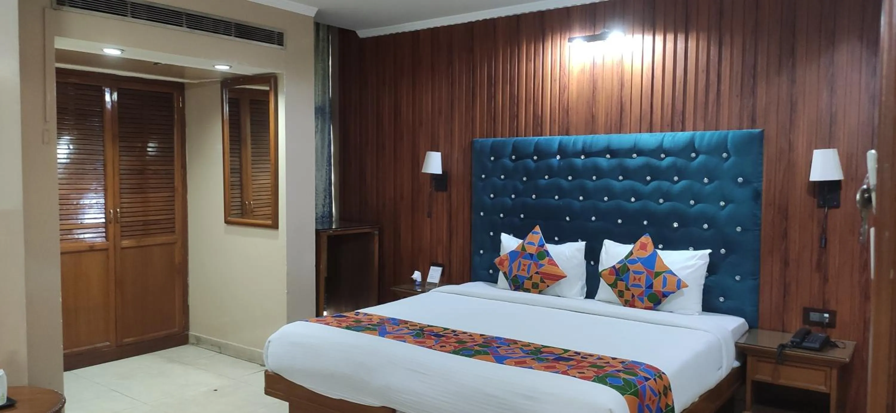 Bed in HOTEL CONCLAVE EXECUTIVE