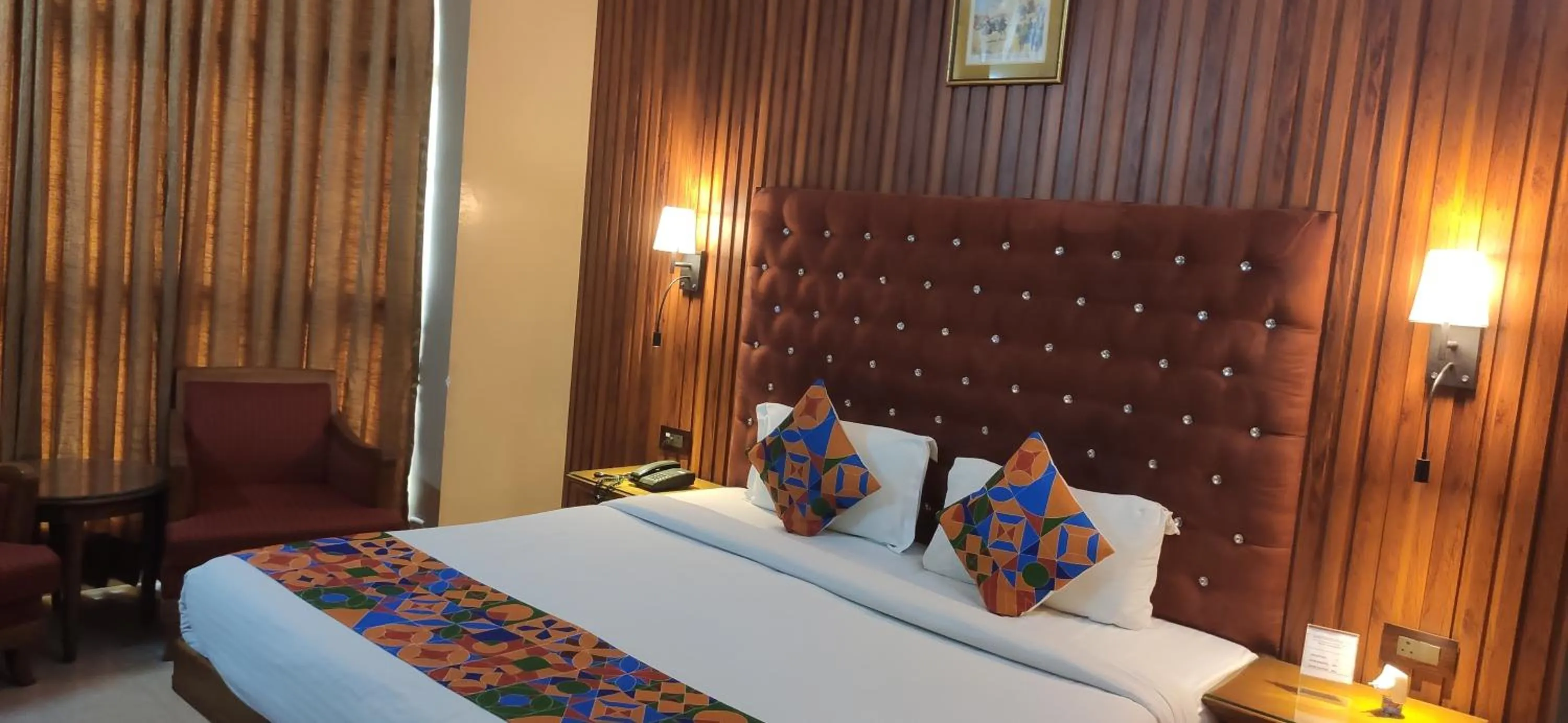 Bed in HOTEL CONCLAVE EXECUTIVE