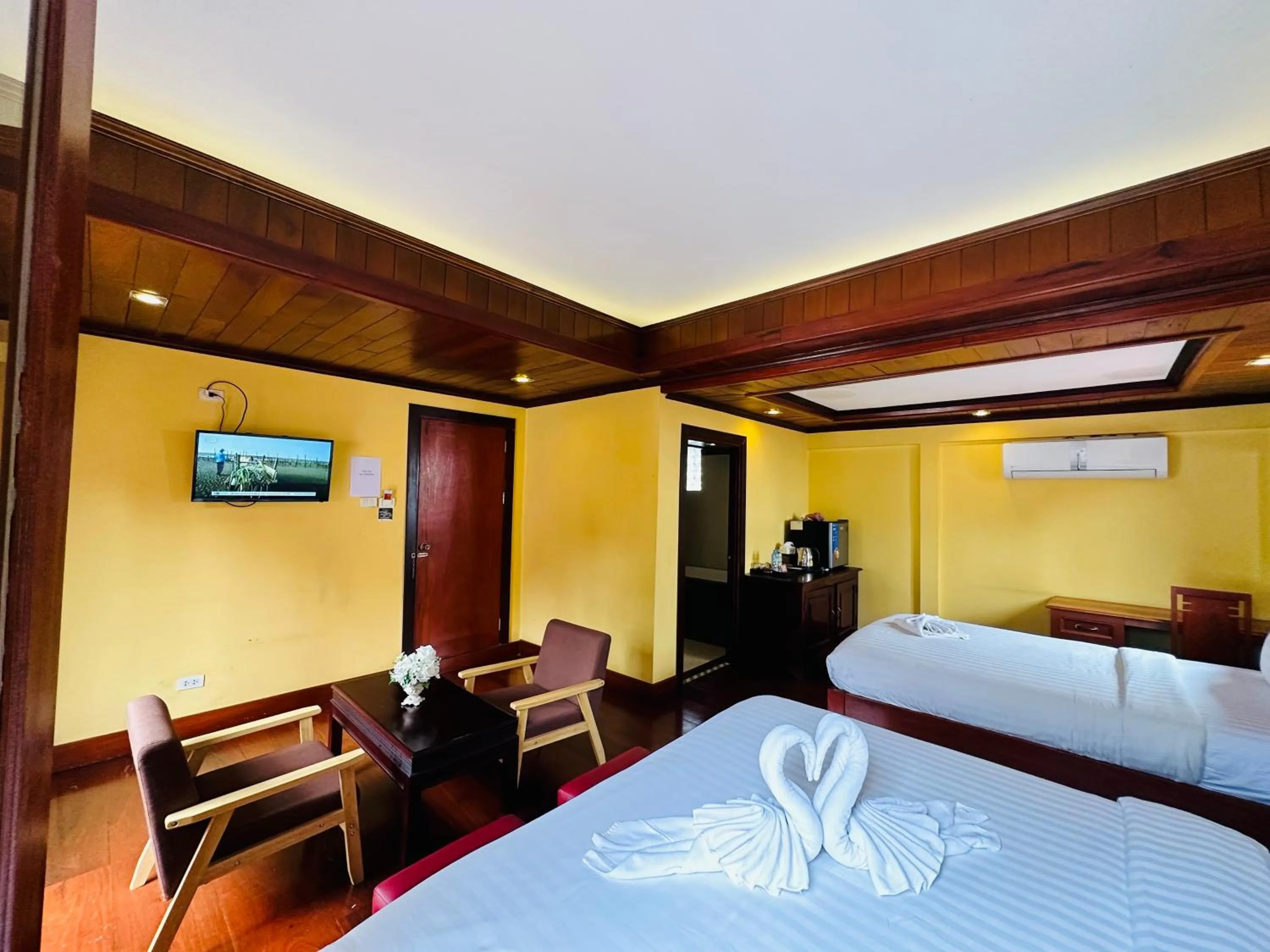 Bed in Villa Phonethip Mekong Riverside