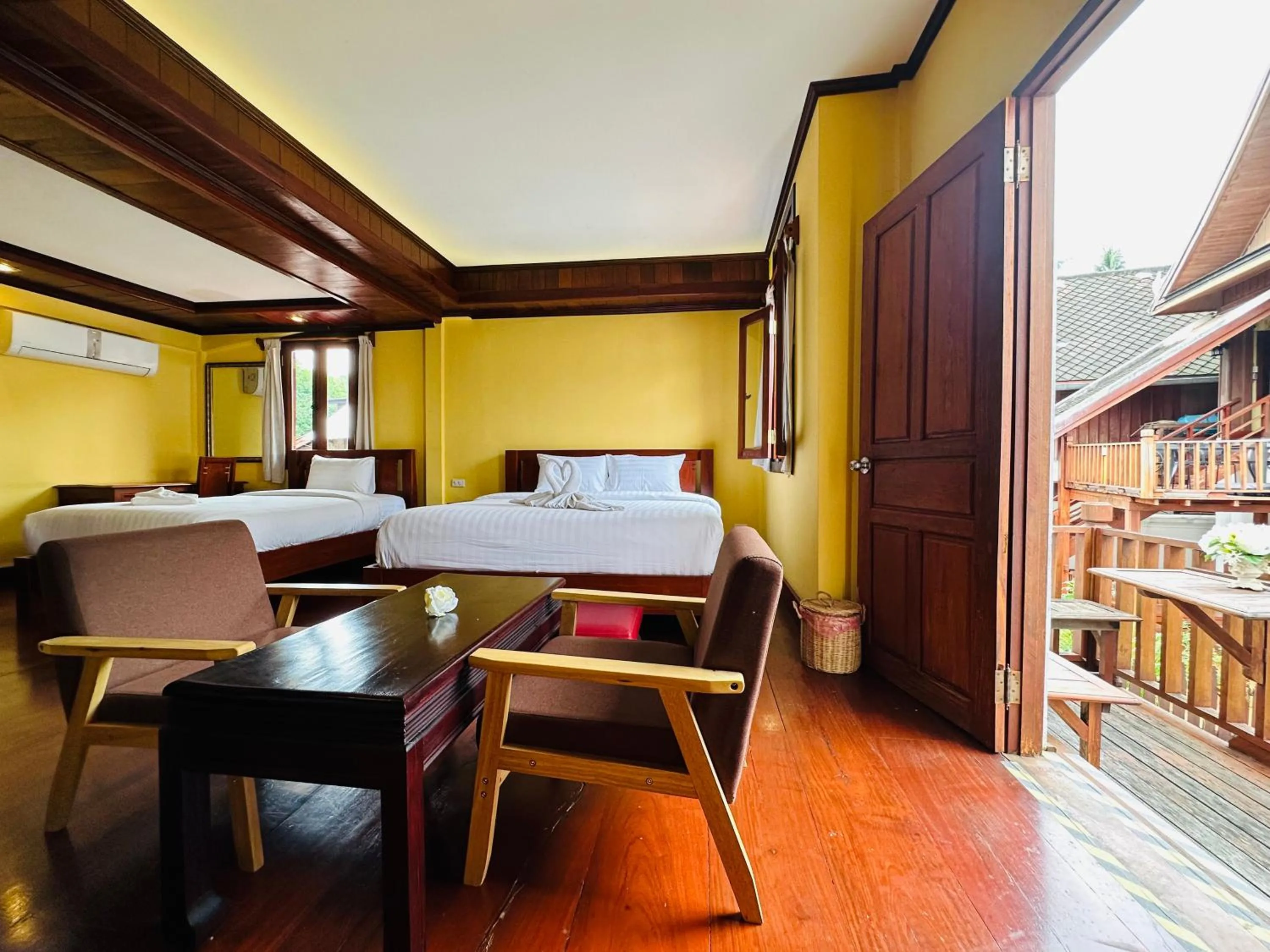 Bed in Villa Phonethip Mekong Riverside