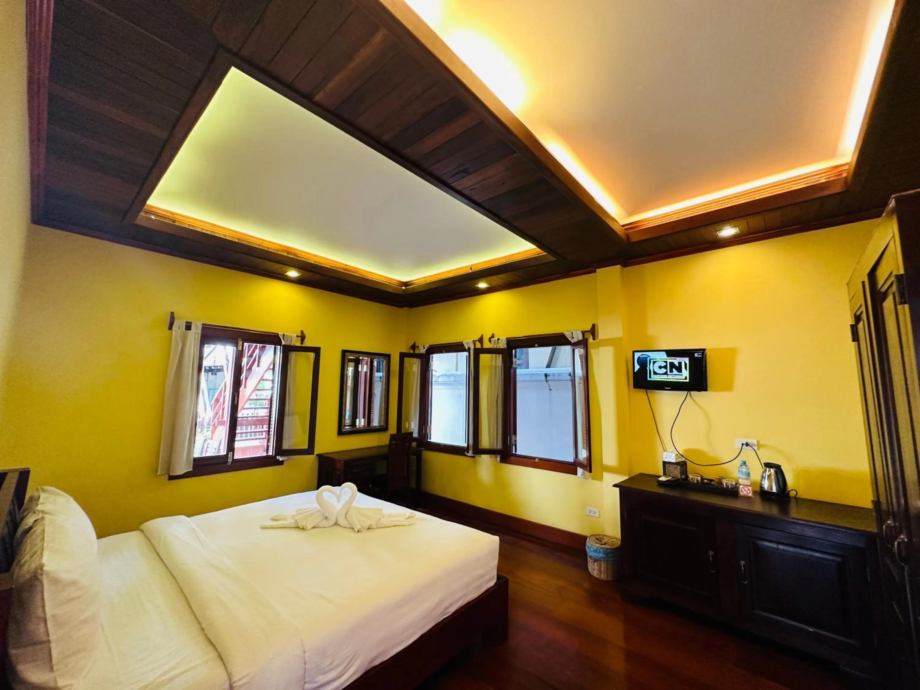 Bed in Villa Phonethip Mekong Riverside