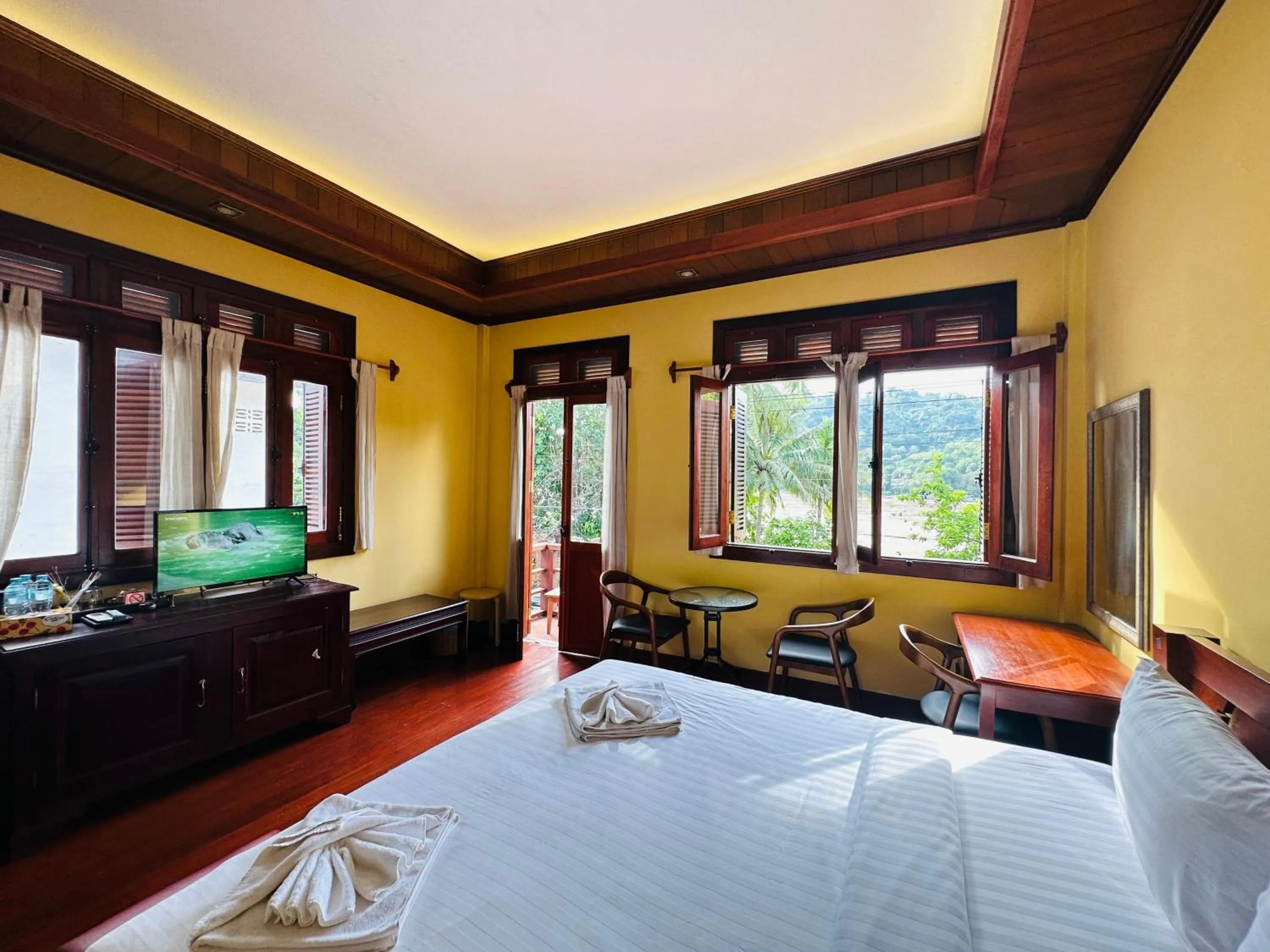 Bed in Villa Phonethip Mekong Riverside