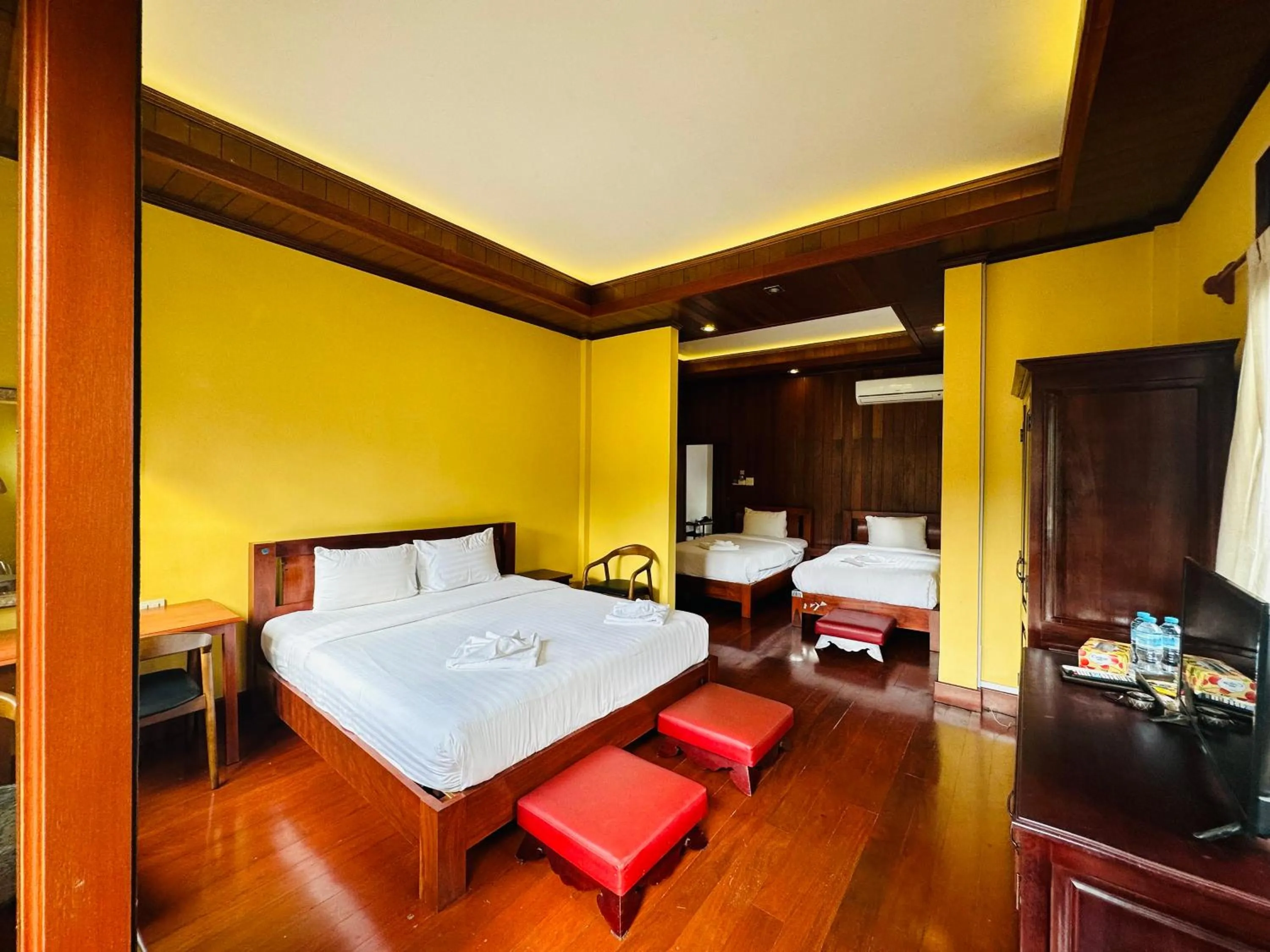 Bed in Villa Phonethip Mekong Riverside