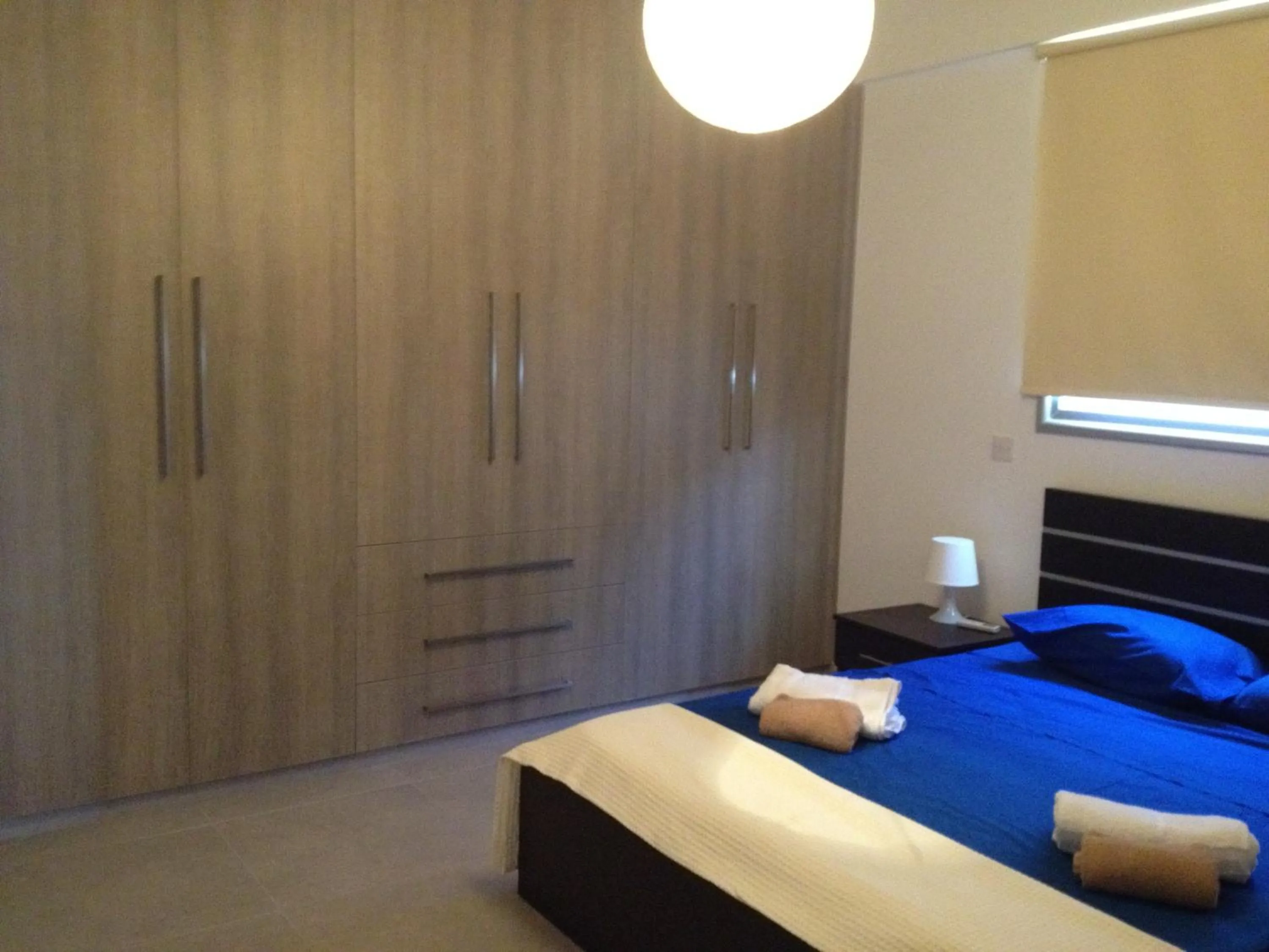 Day, Bed in Niro Apartments
