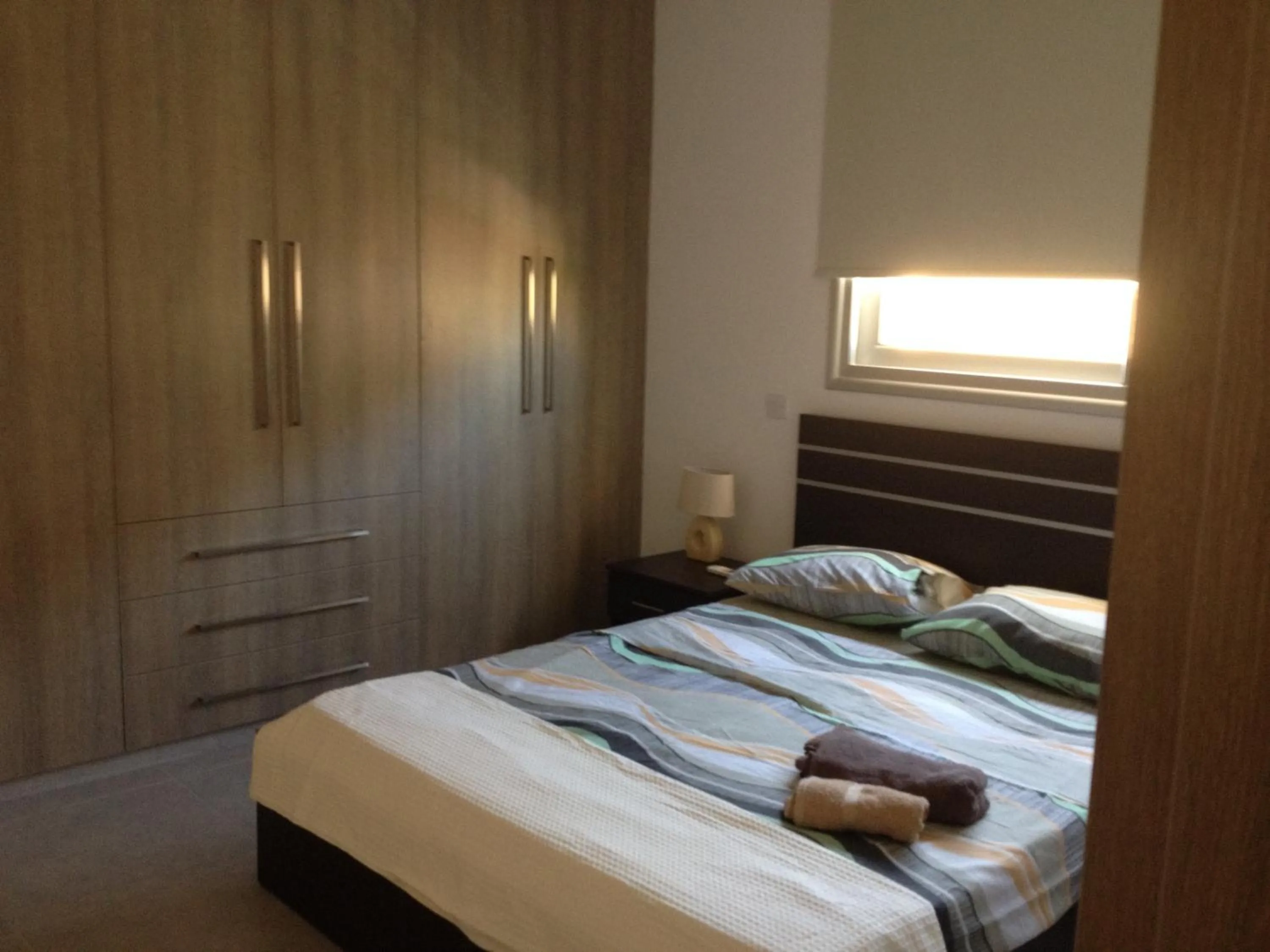 Day, Bed in Niro Apartments
