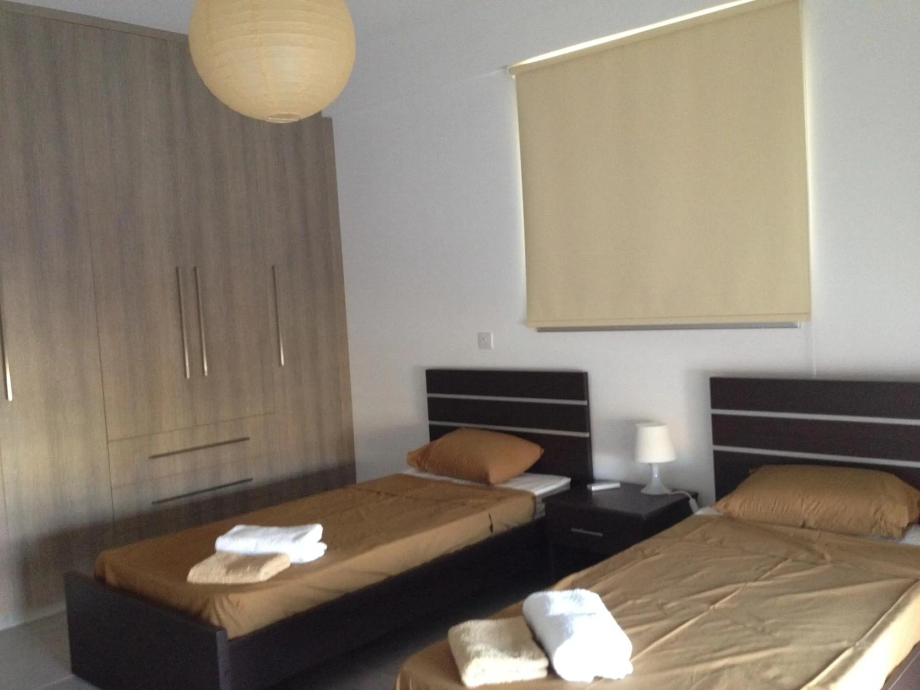 Bedroom, Bed in Niro Apartments