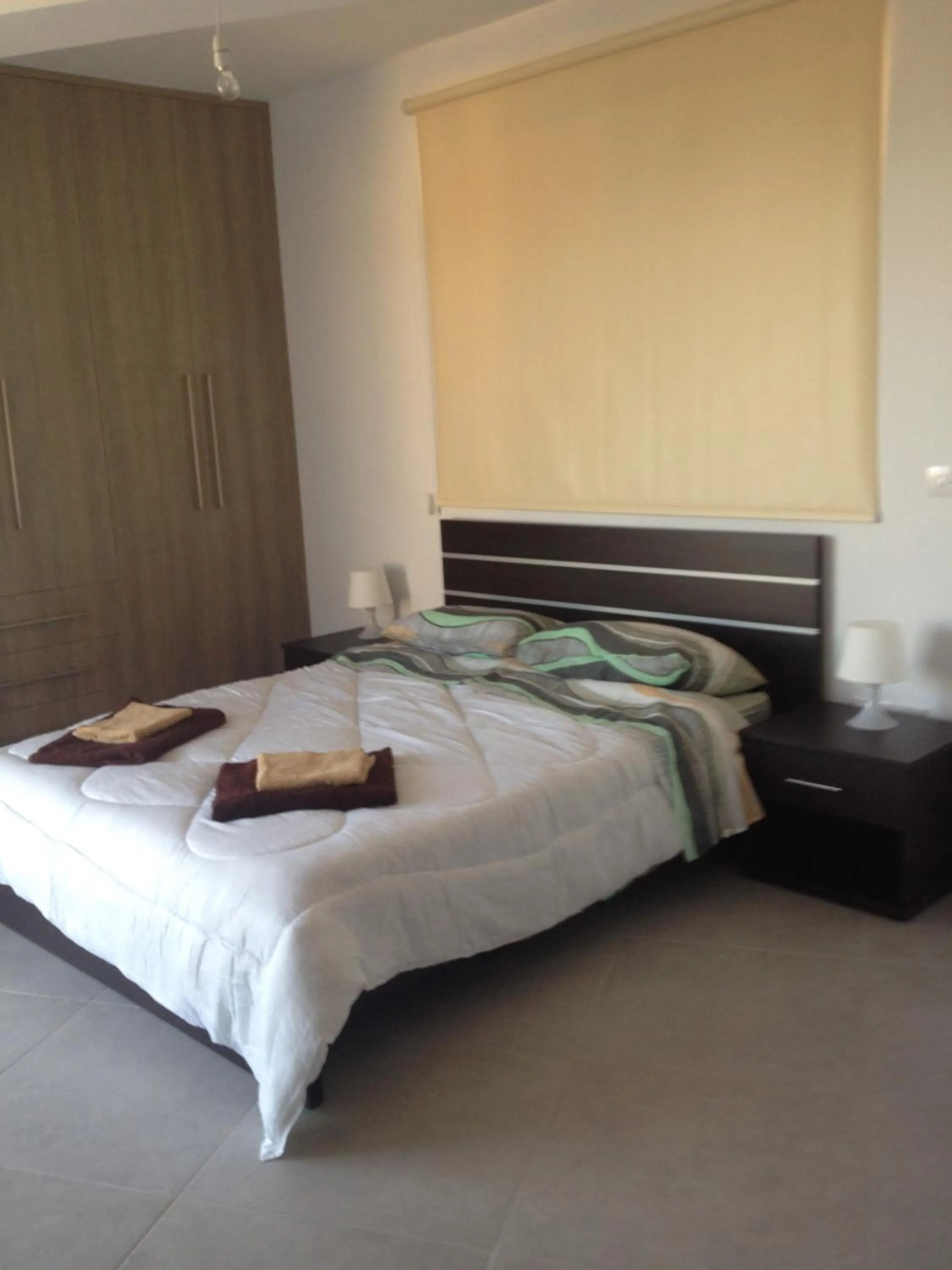 Bedroom, Bed in Niro Apartments