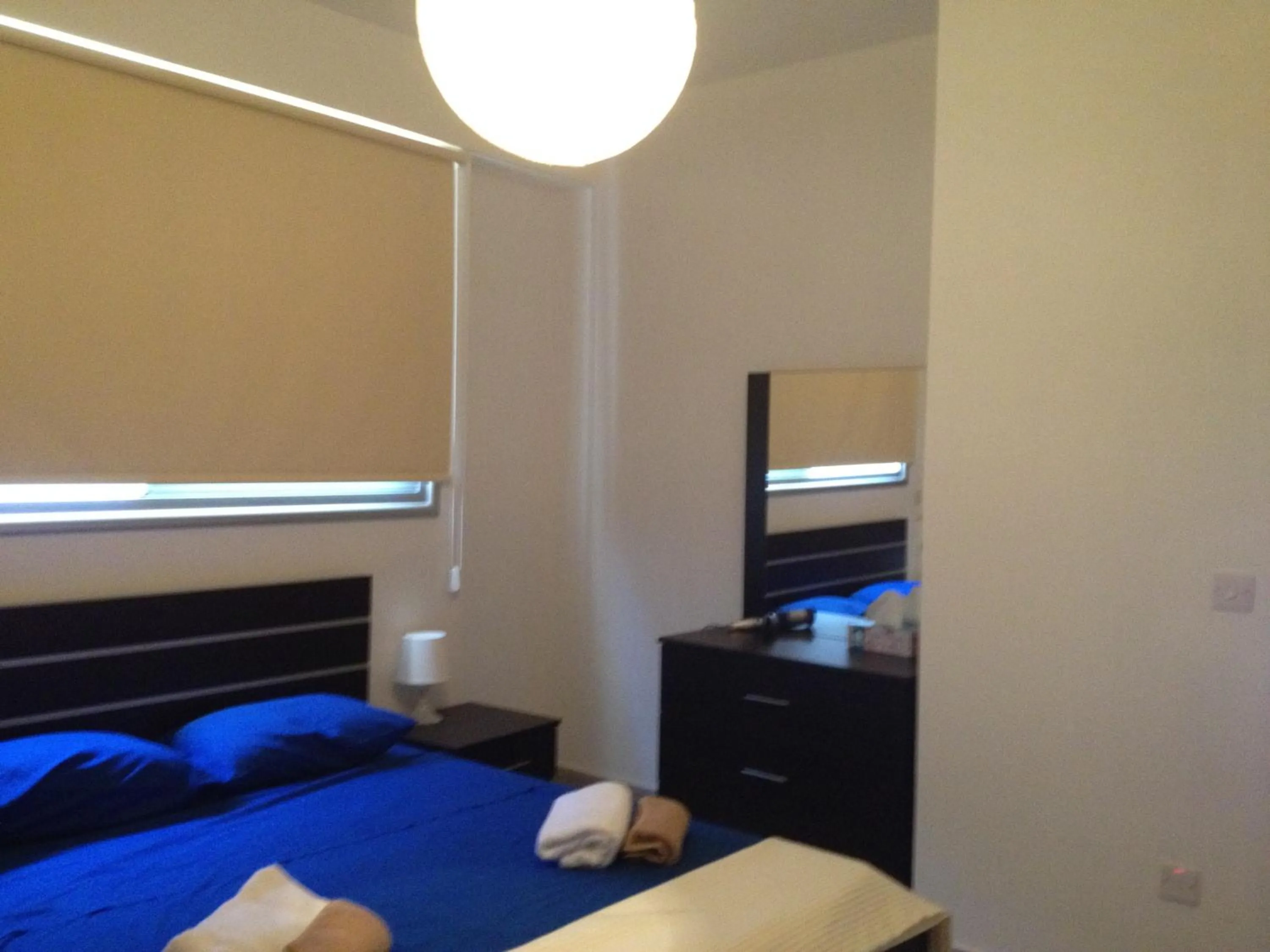 Day, Bed in Niro Apartments