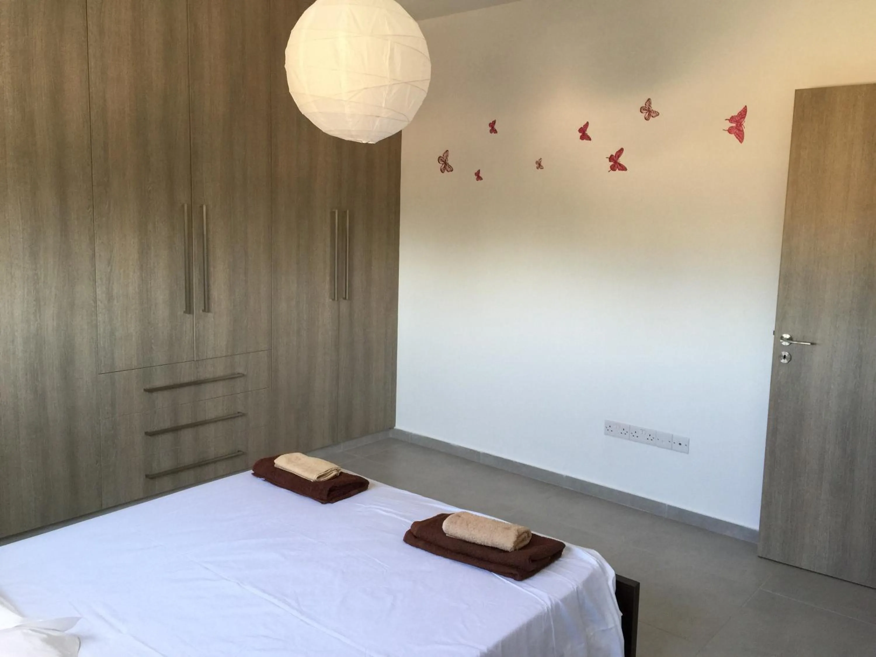Day, Bed in Niro Apartments