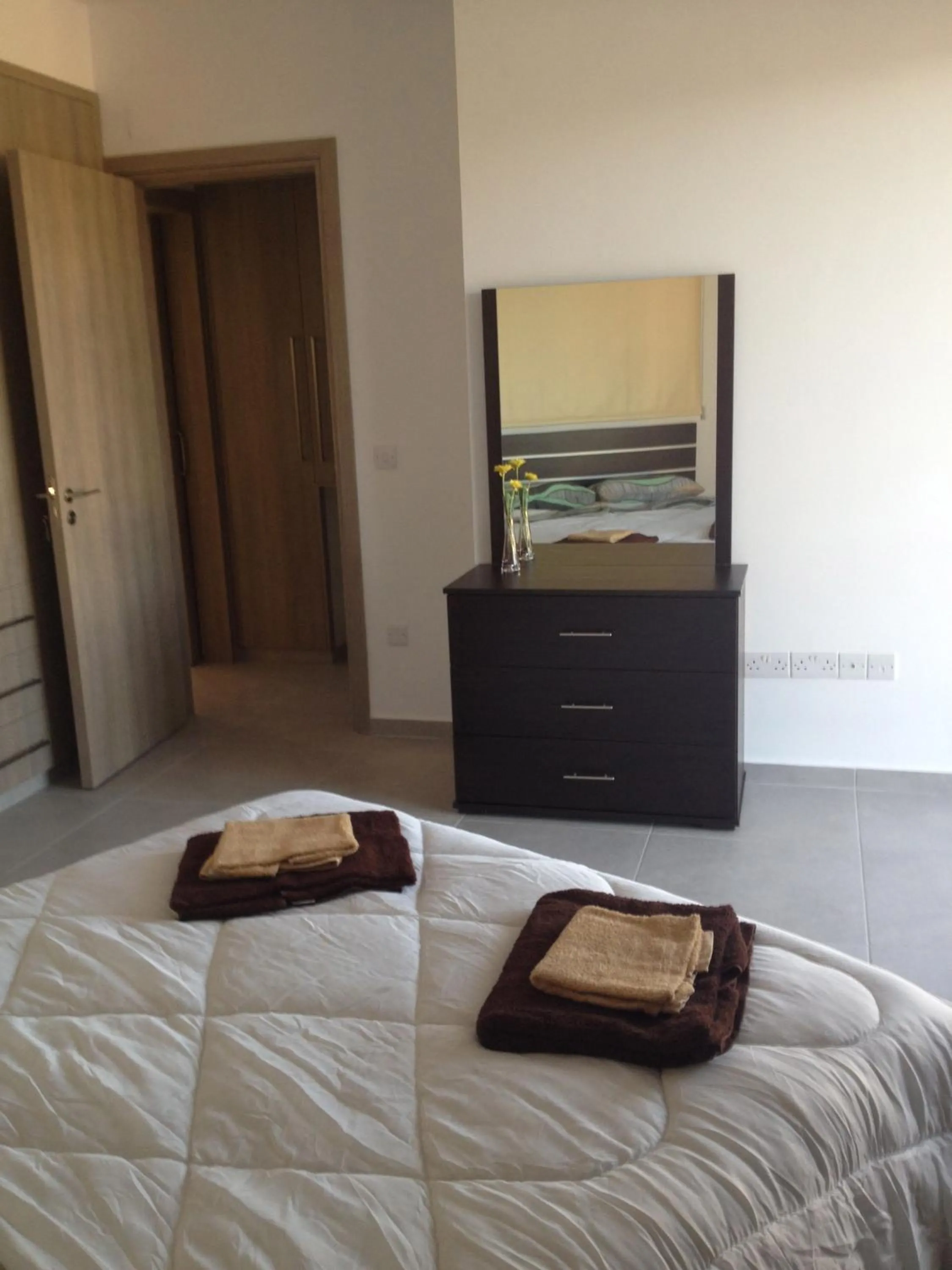 Day, Bed in Niro Apartments