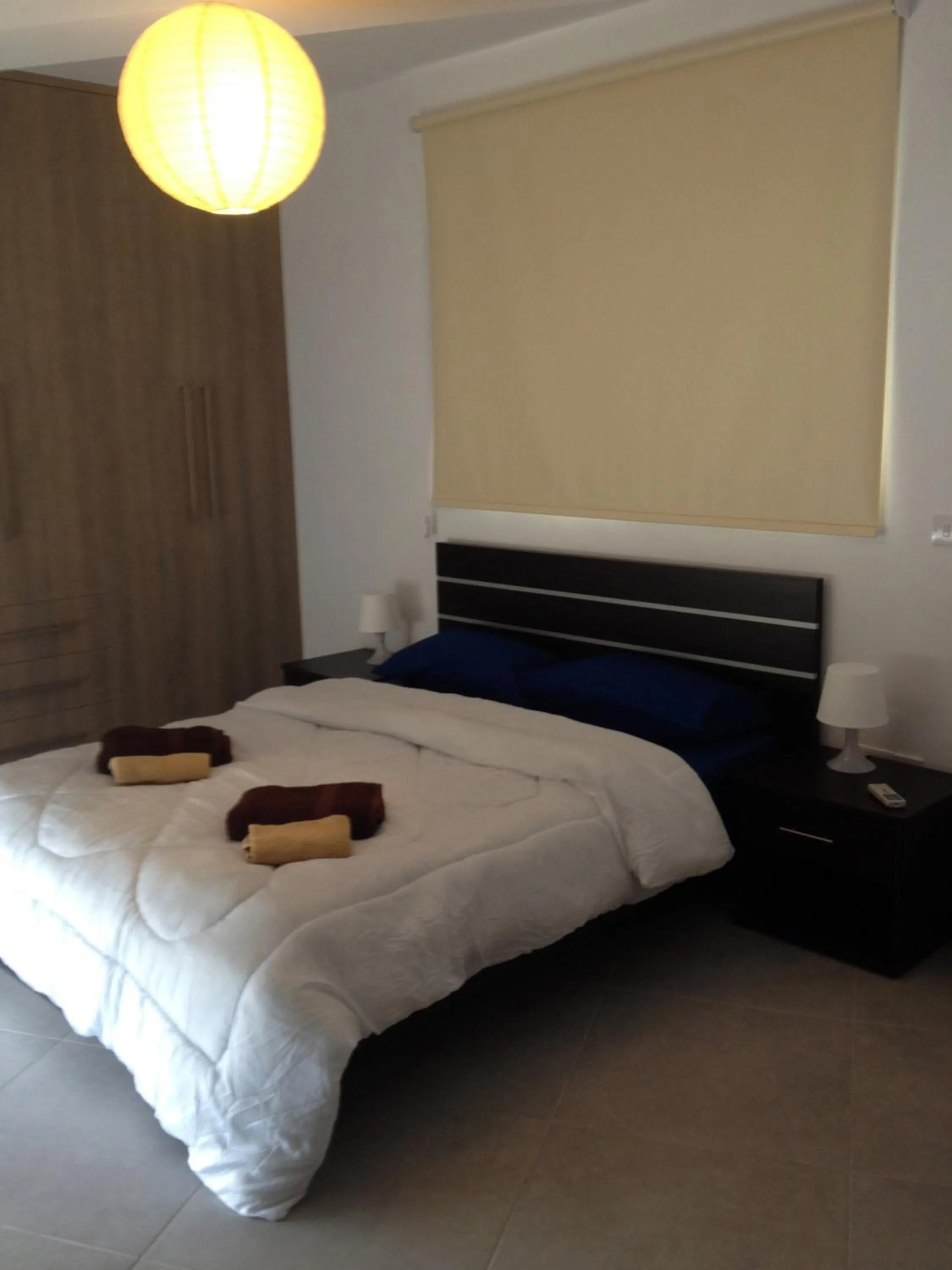 Day, Bed in Niro Apartments