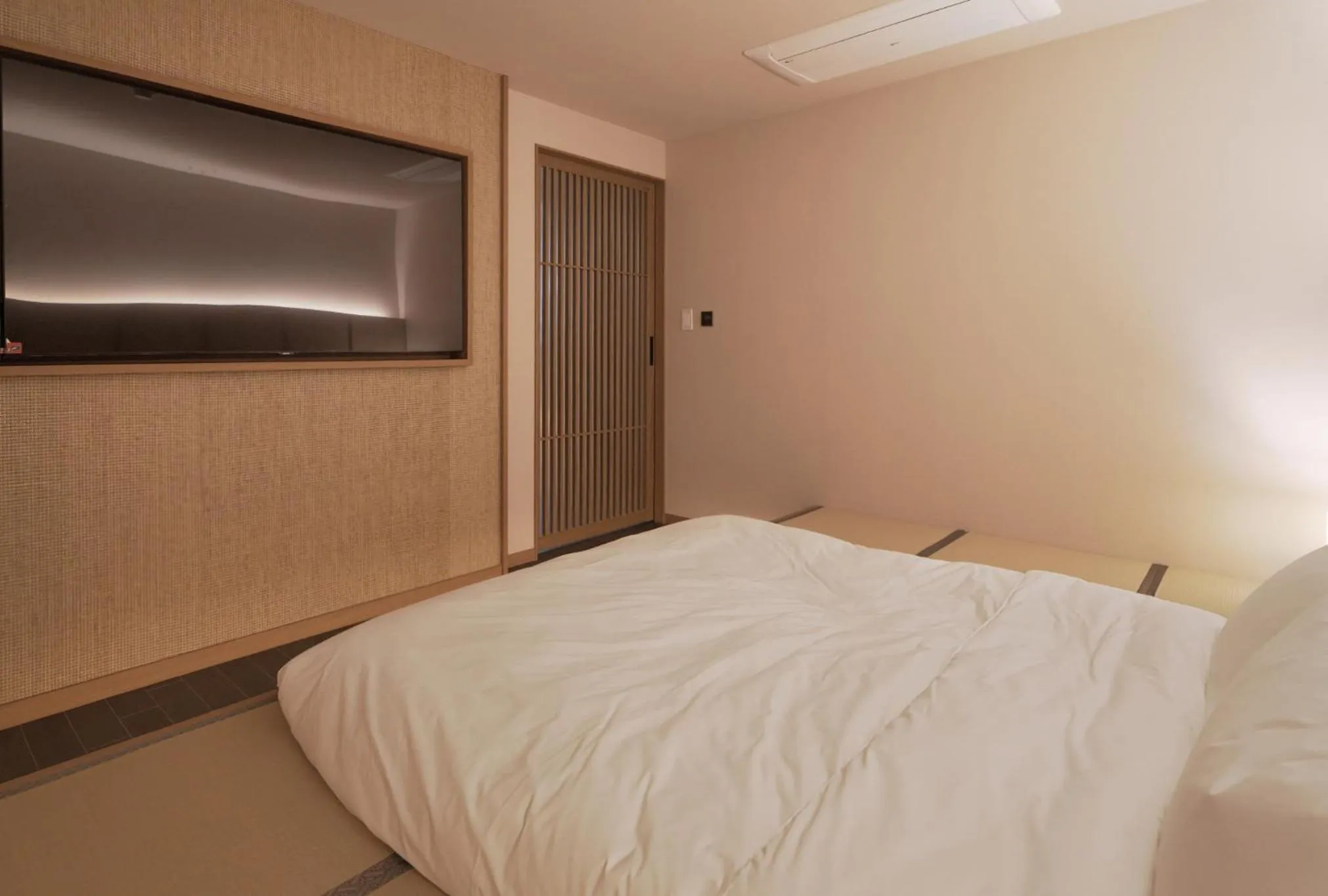 Bed in Gyeongju Denbasta Ryokan