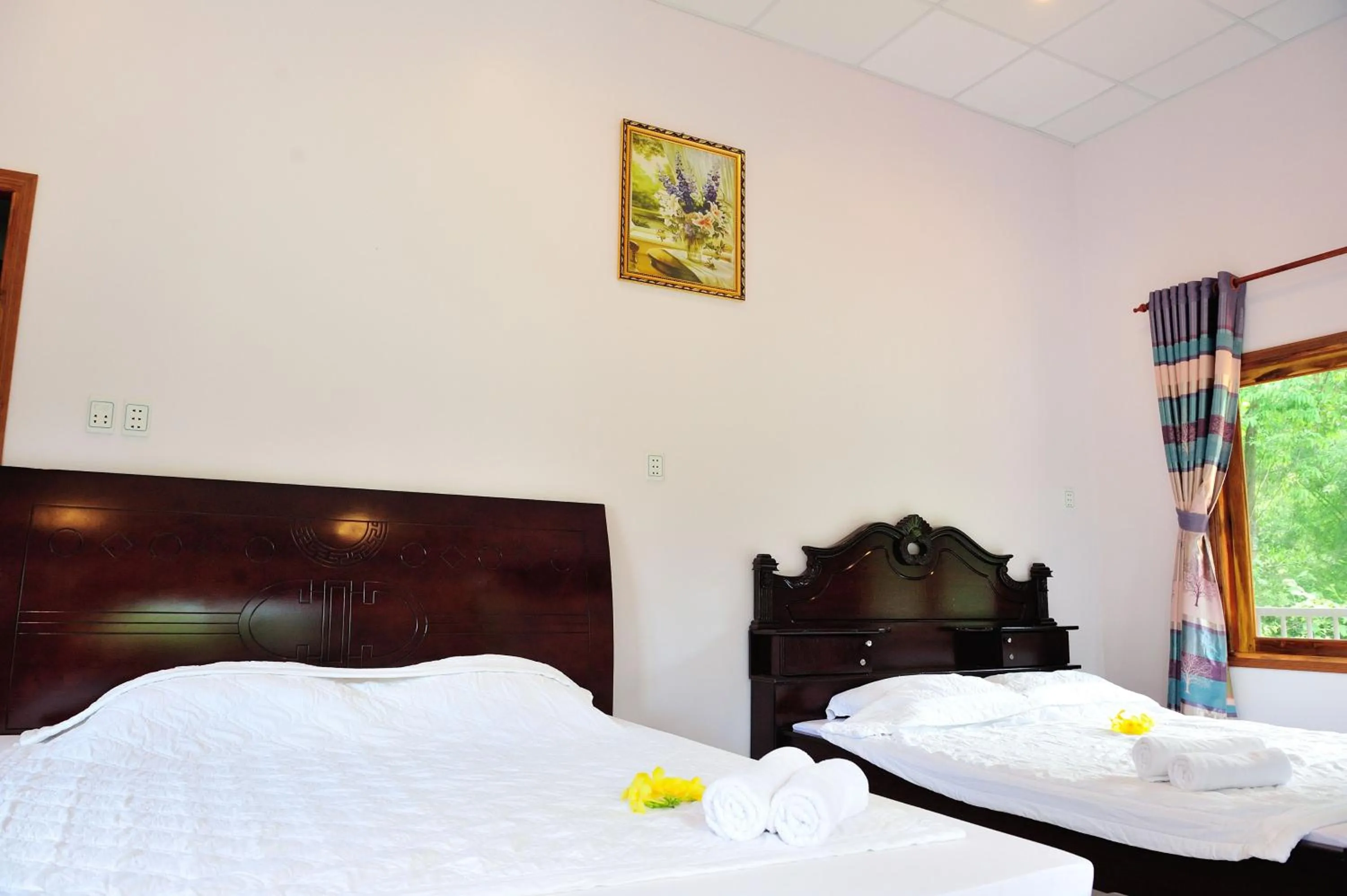 Bed in Tang Thanh Phat Resort