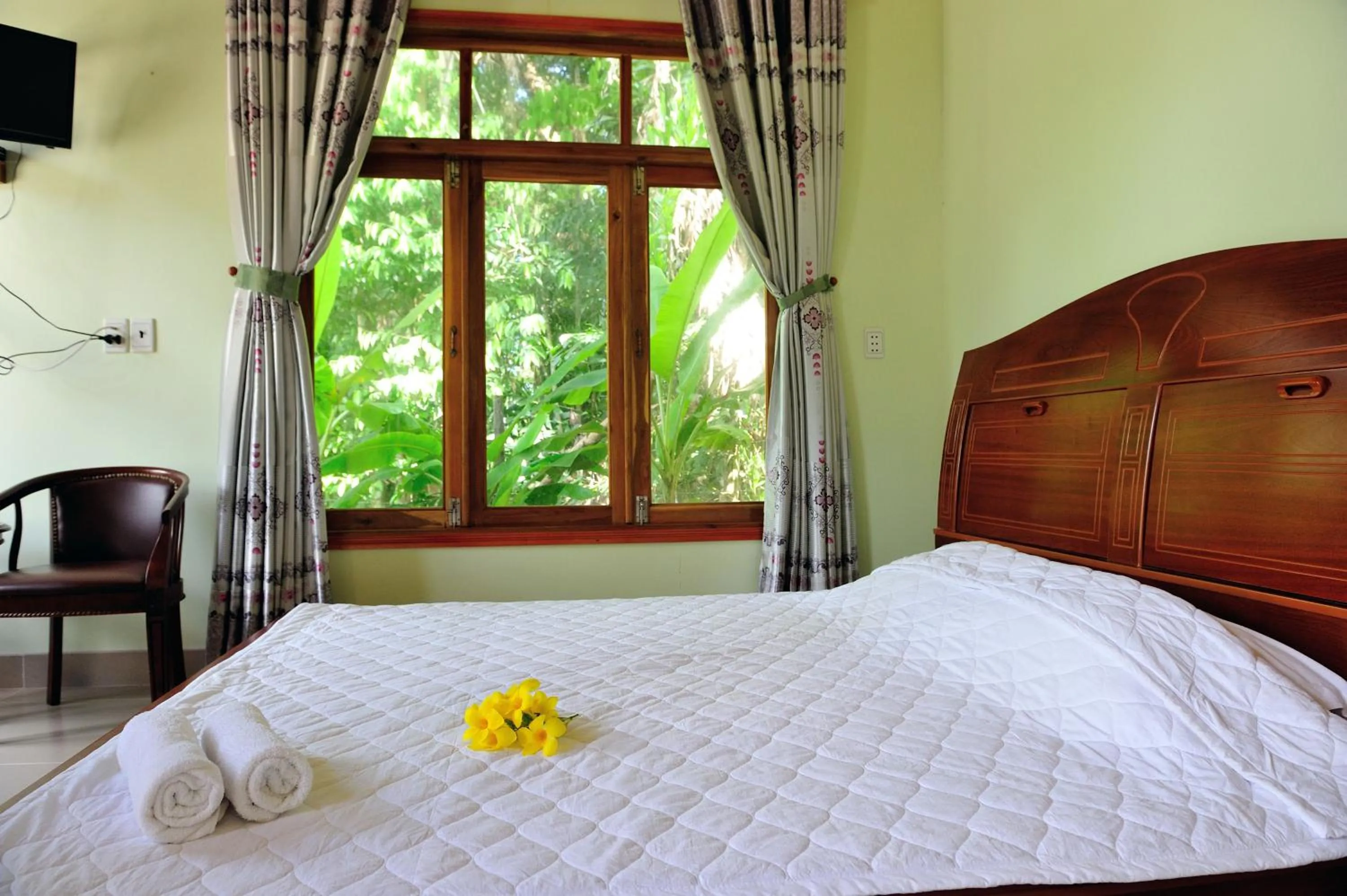 Bed in Tang Thanh Phat Resort