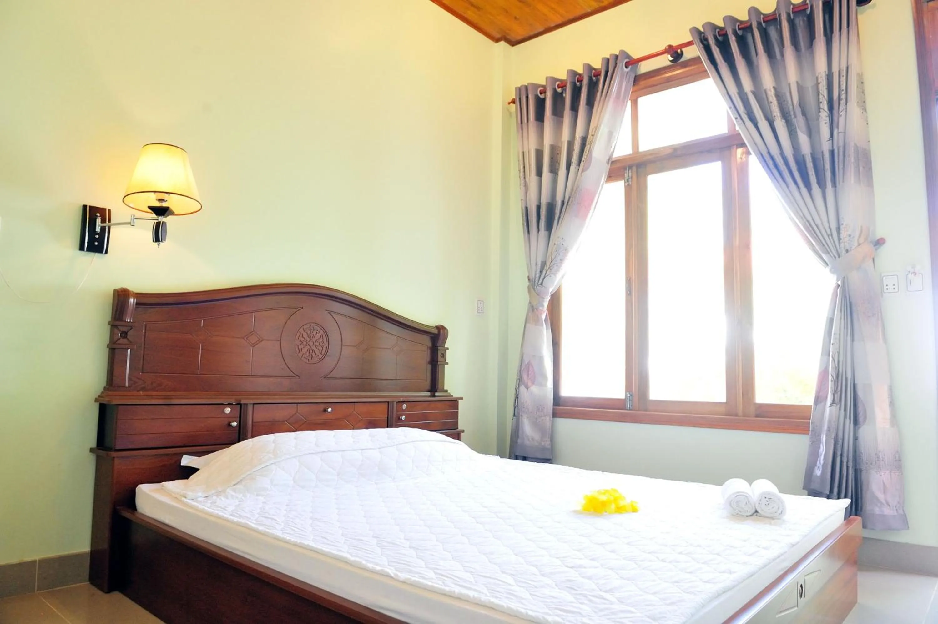 Bed in Tang Thanh Phat Resort