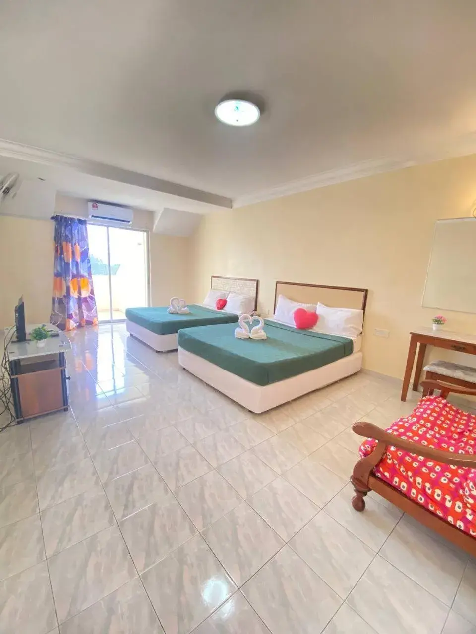 Photo of the whole room, Bed in Teluk Batik Holiday Apartment Photo of the whole room, Bed in Teluk Batik Holiday Apartment