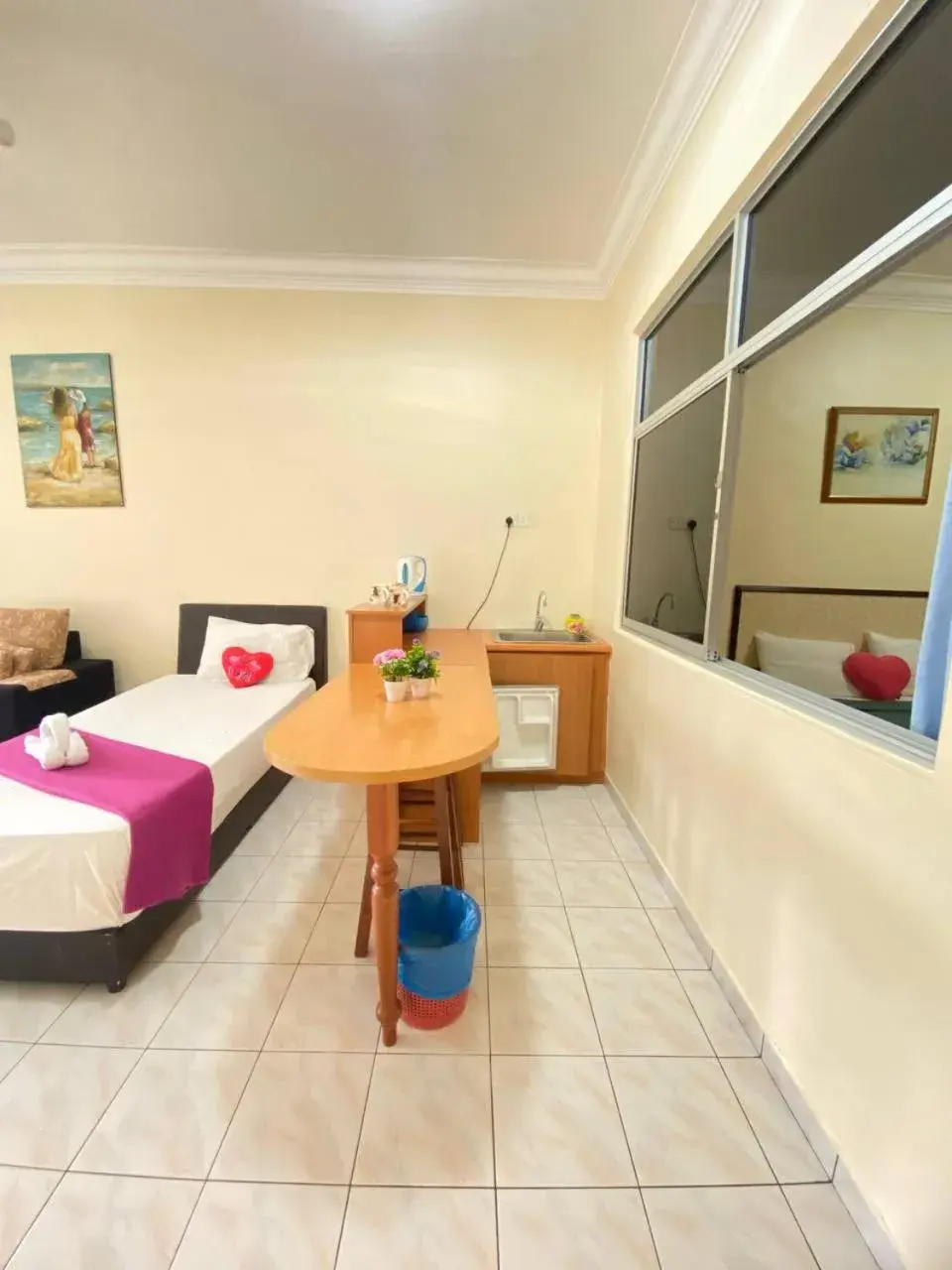 Kitchen or kitchenette, Bed in Teluk Batik Holiday Apartment Kitchen or kitchenette, Bed in Teluk Batik Holiday Apartment