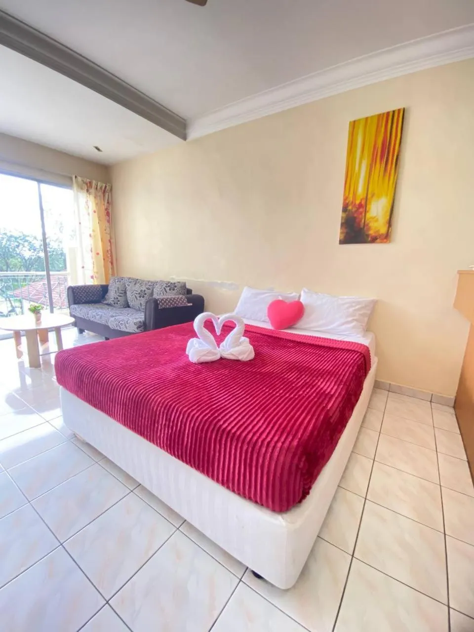 Living room, Bed in Teluk Batik Holiday Apartment