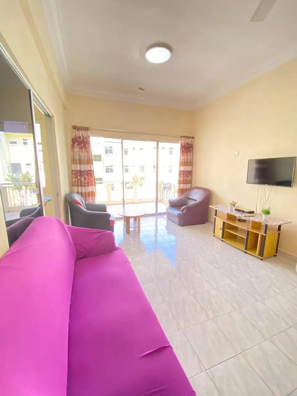 Living room in Teluk Batik Holiday Apartment