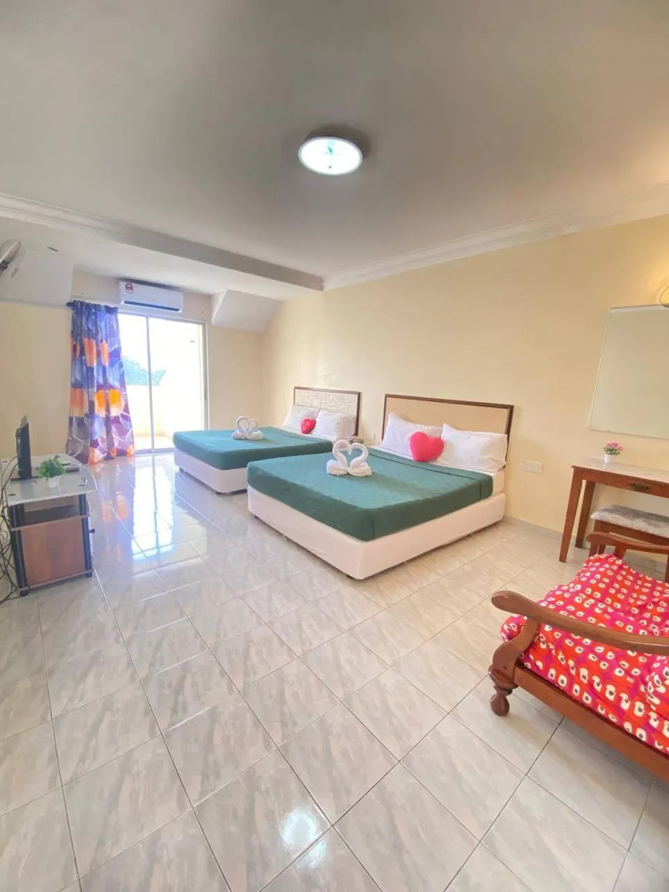 Photo of the whole room, Bed in Teluk Batik Holiday Apartment