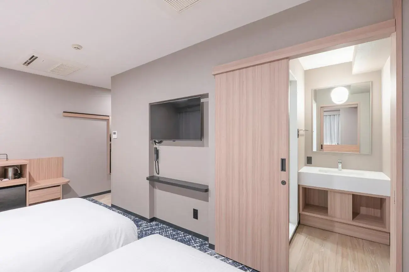 Bed in Washington R&B Hotel Nagoya Sakae Higashi Bed in Washington R&B Hotel Nagoya Sakae Higashi