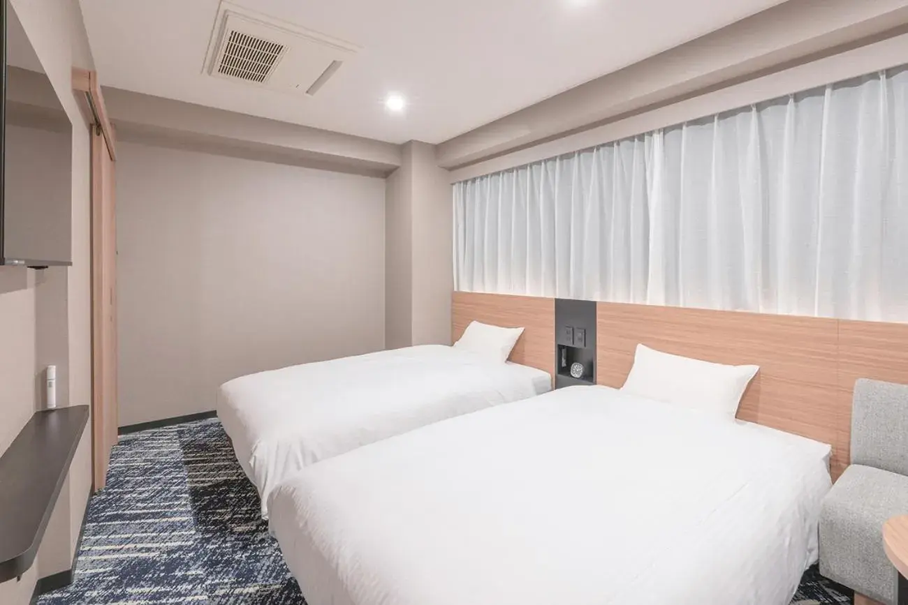 Bed in Washington R&B Hotel Nagoya Sakae Higashi Bed in Washington R&B Hotel Nagoya Sakae Higashi