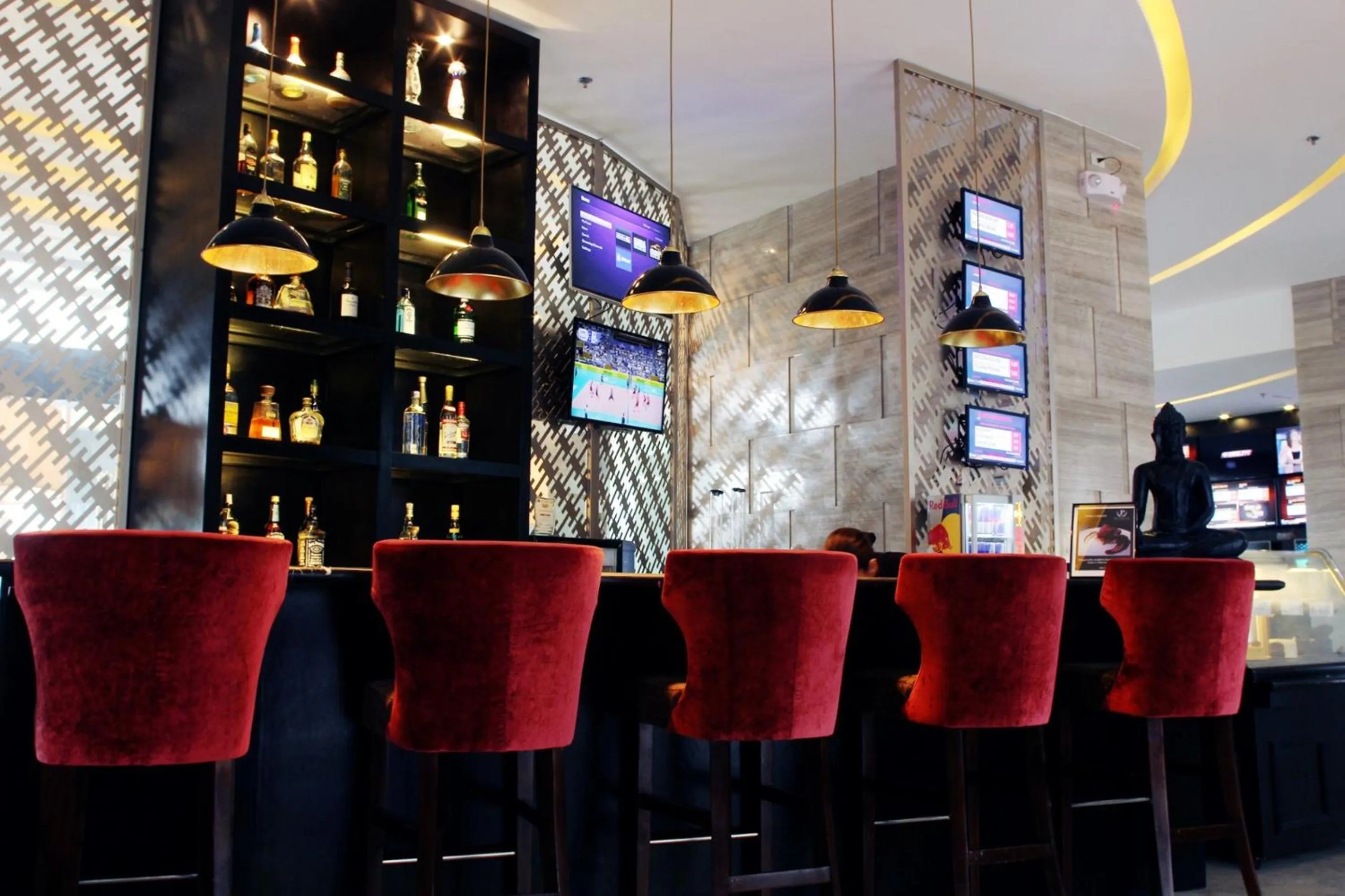 Lounge or bar in The Penthouse Hotel and Residences