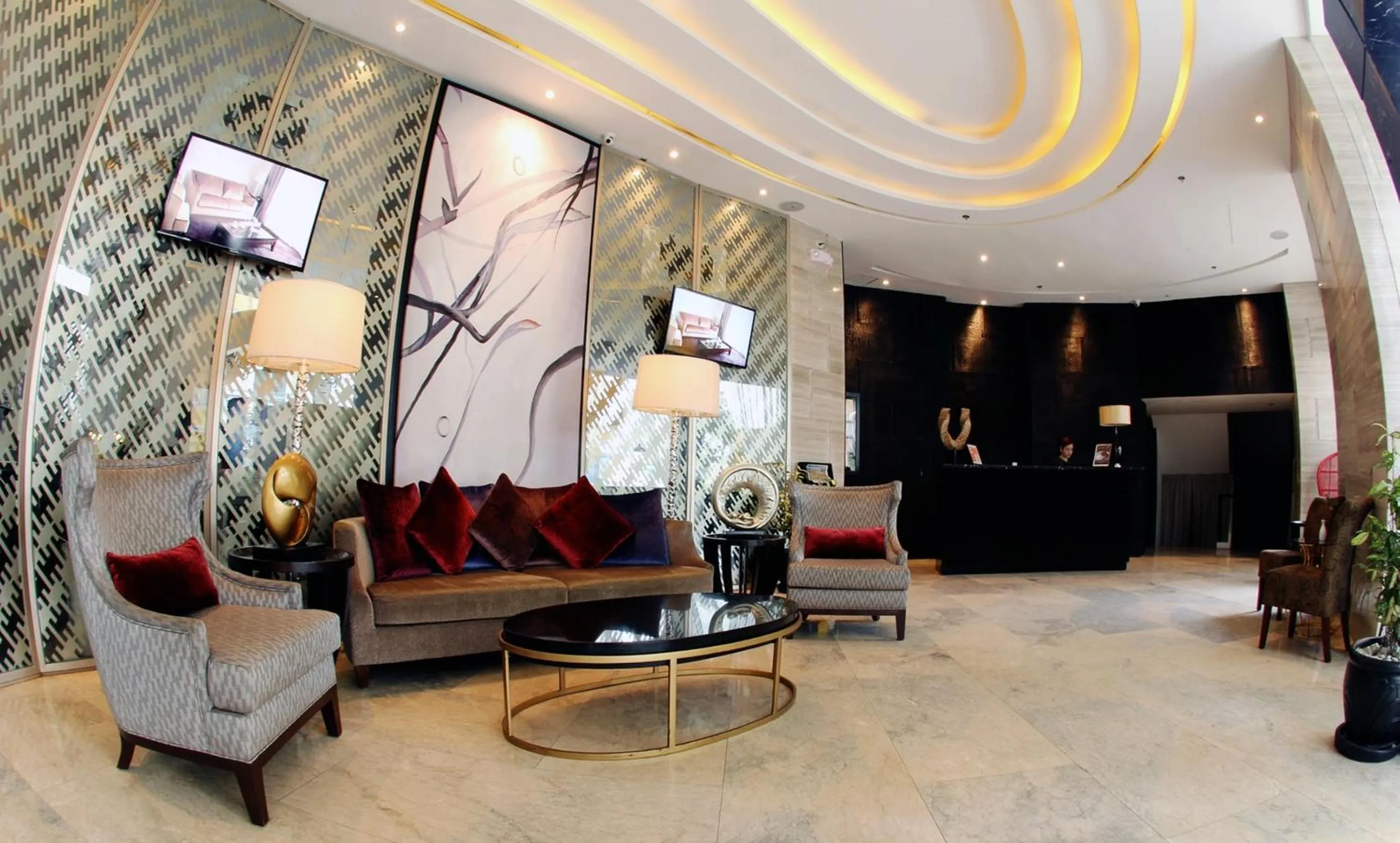 Communal lounge/ TV room in The Penthouse Hotel and Residences