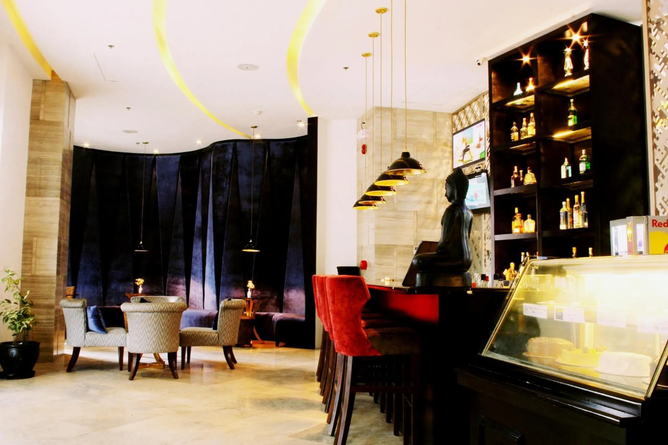 Lounge or bar in The Penthouse Hotel and Residences