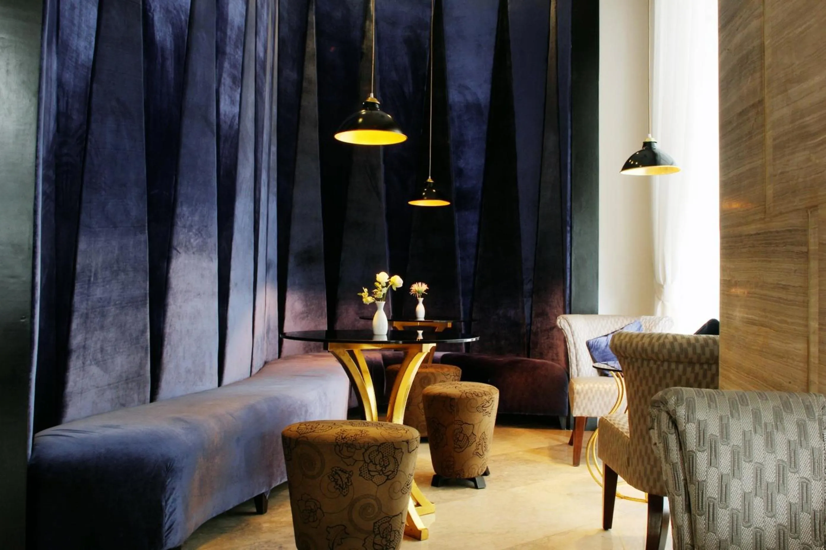 Communal lounge/ TV room in The Penthouse Hotel and Residences