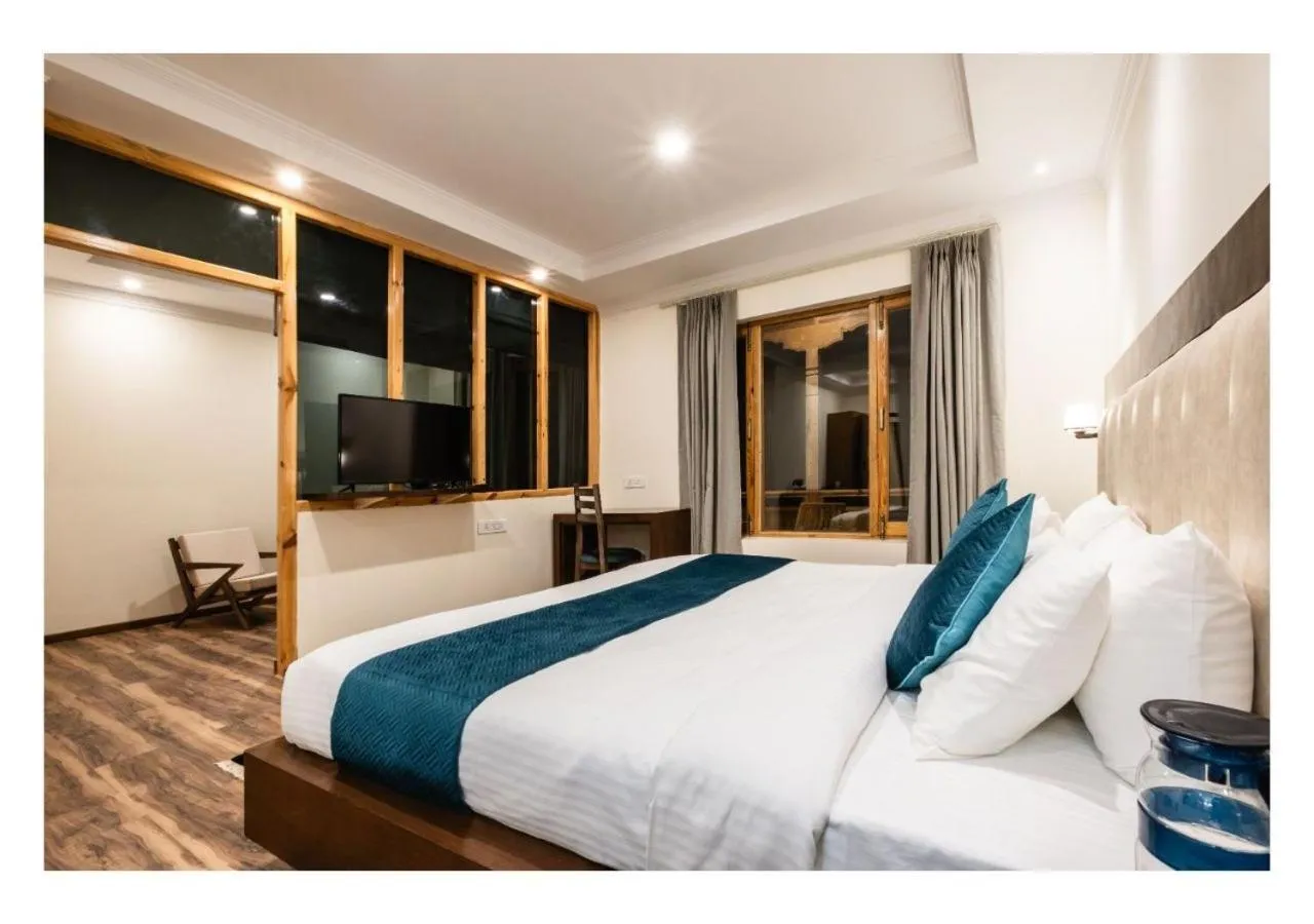 Bed in Hotel Kharu Vilaasa