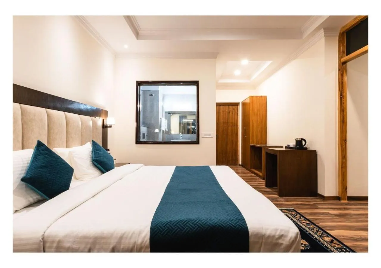 Bed in Hotel Kharu Vilaasa