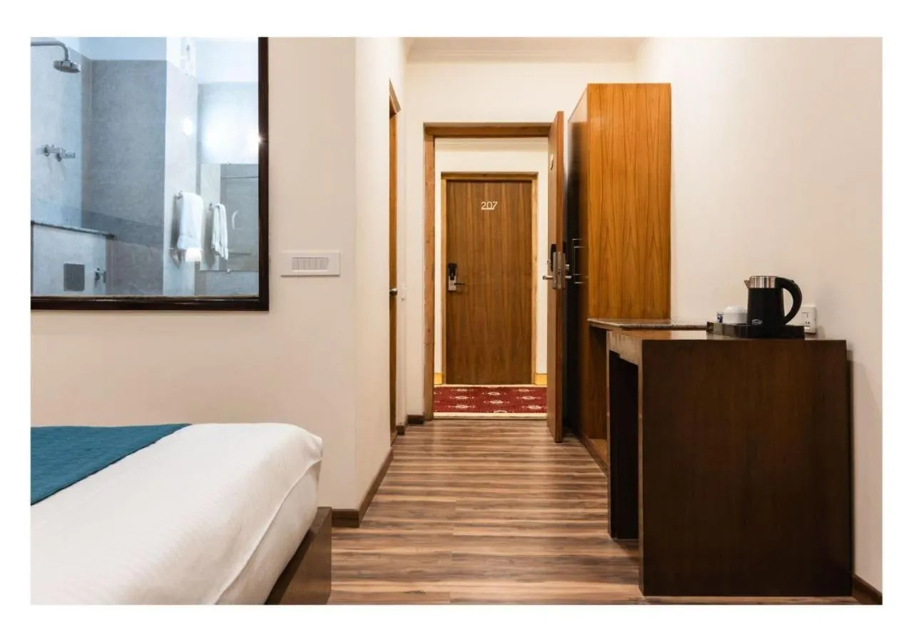 Bed in Hotel Kharu Vilaasa