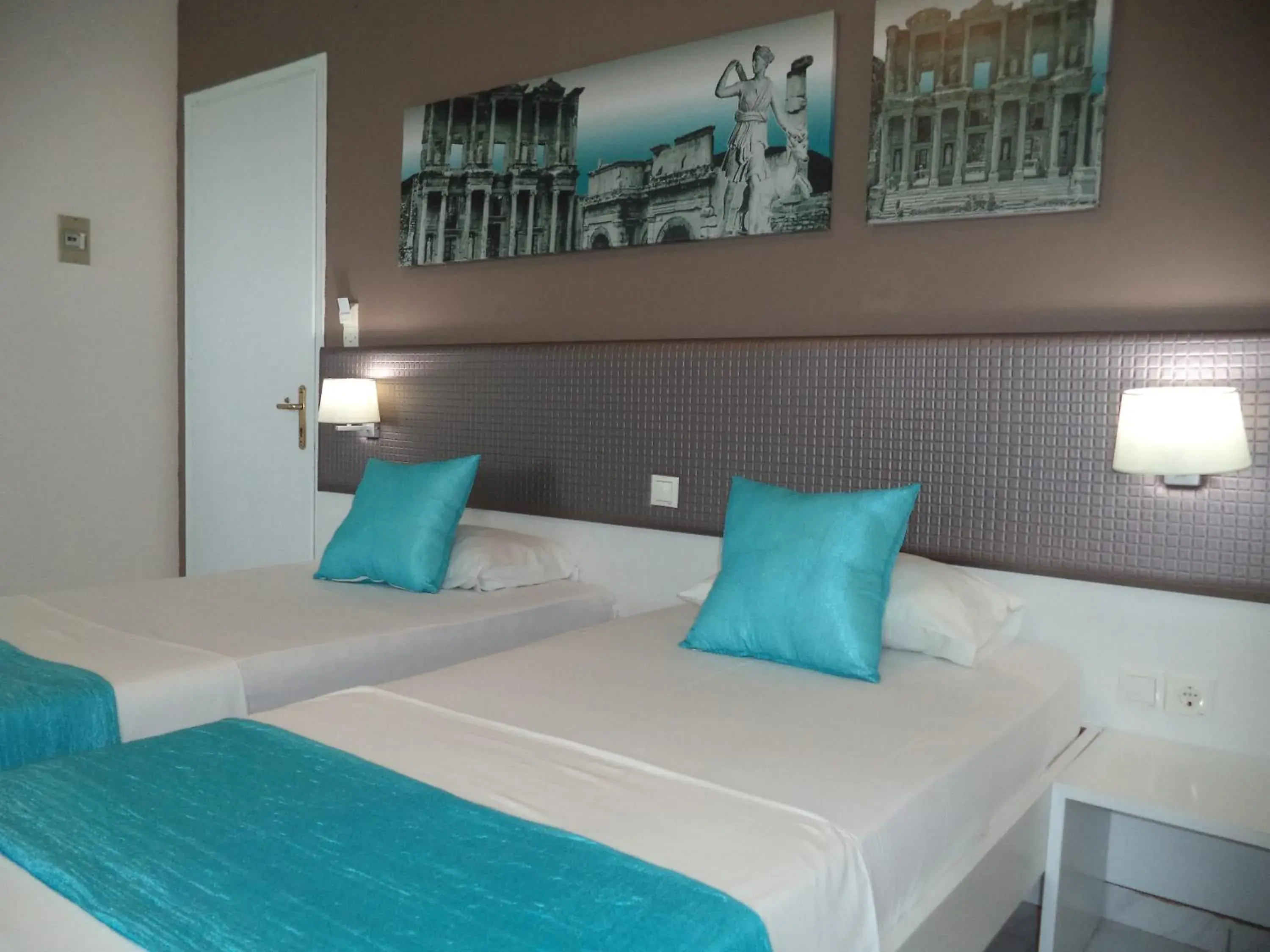 Bed in Blue Nest Hotel Bed in Blue Nest Hotel