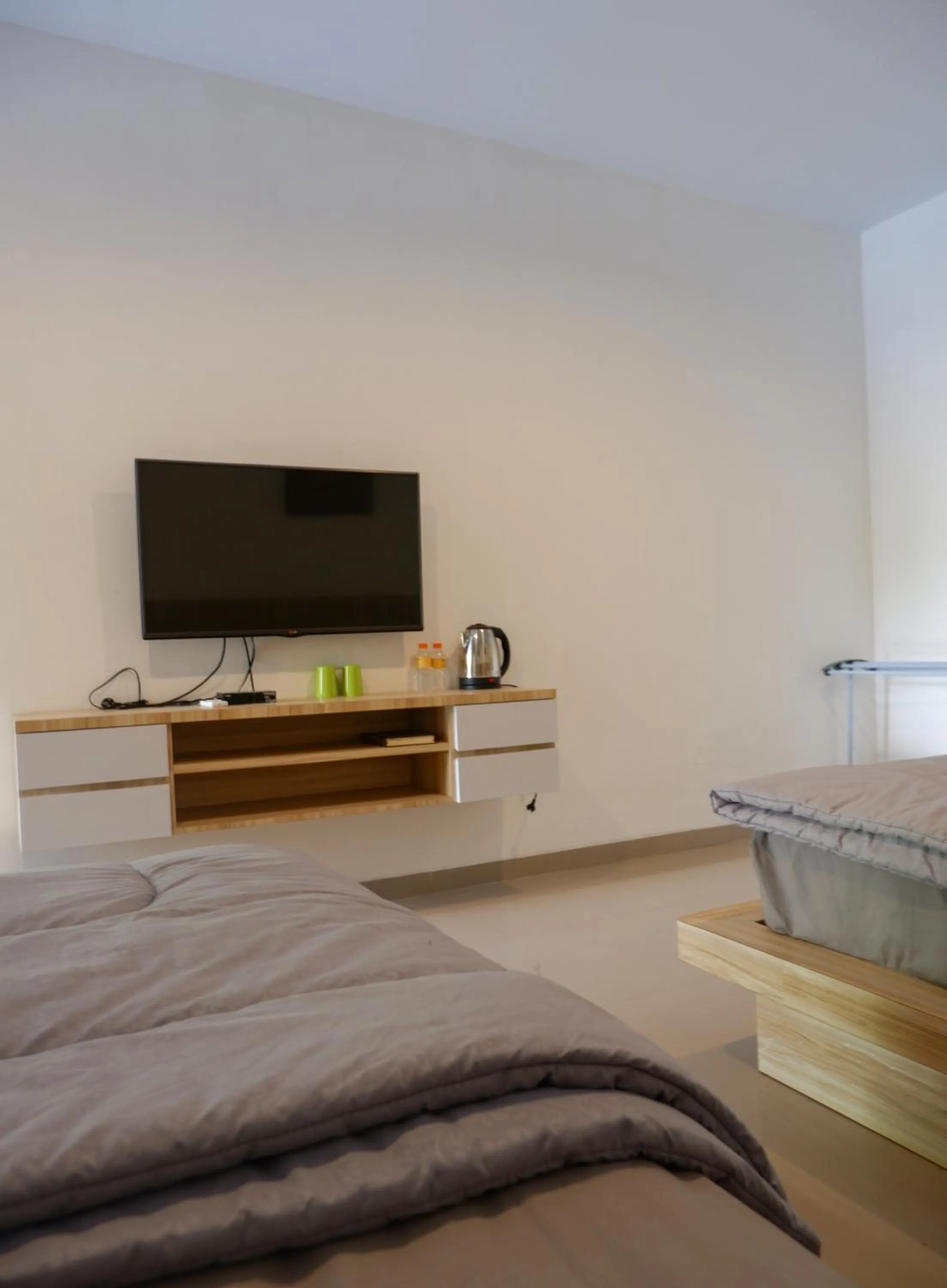 Bed in Homestay Joglo Seruni Syariah