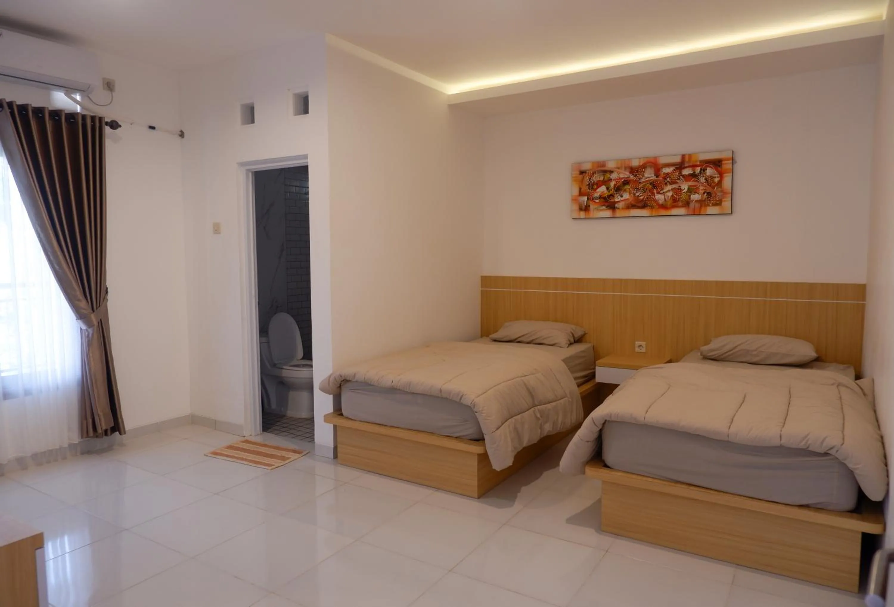 Bed in Homestay Joglo Seruni Syariah