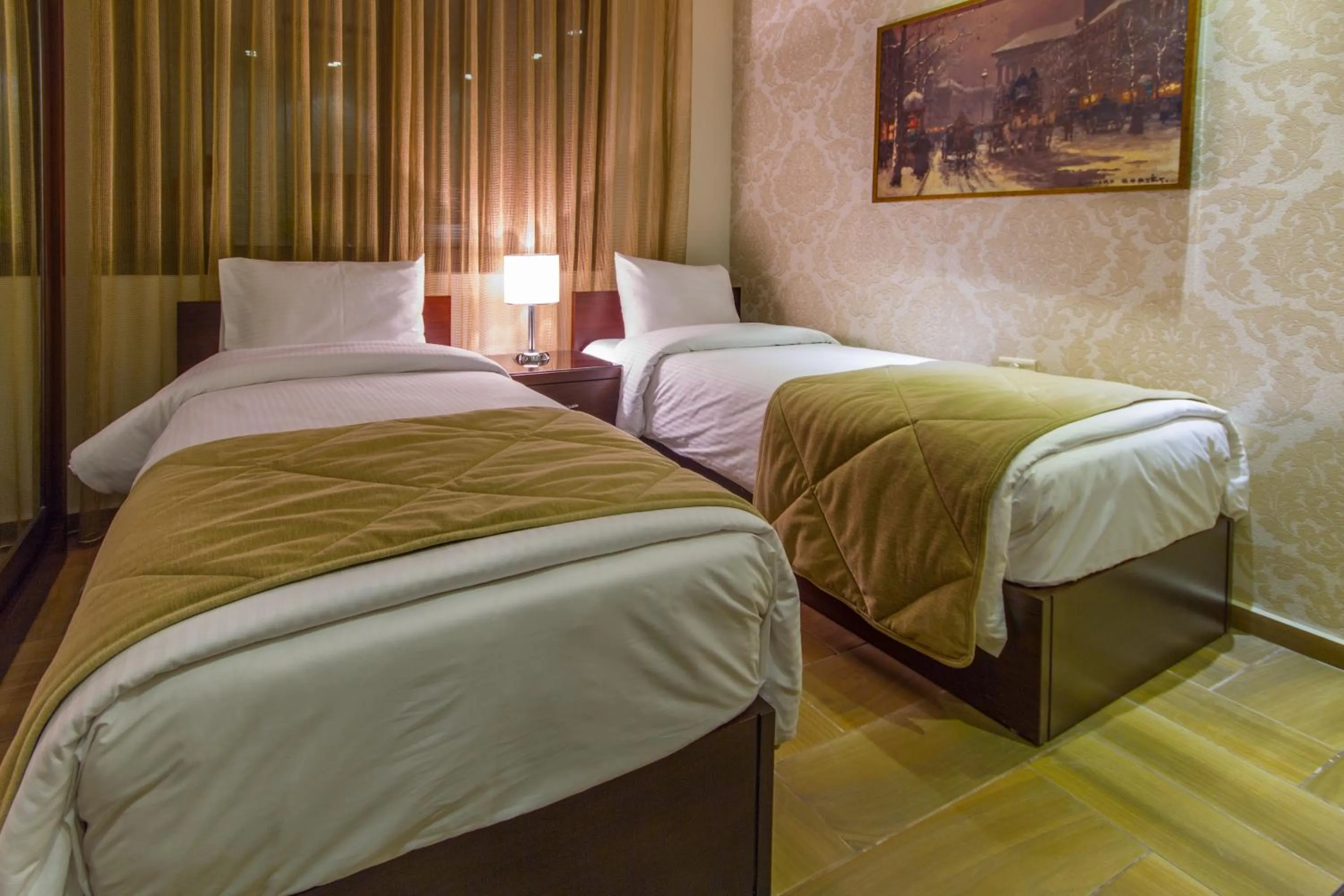 Photo of the whole room, Bed in Nadine Hotel Suites