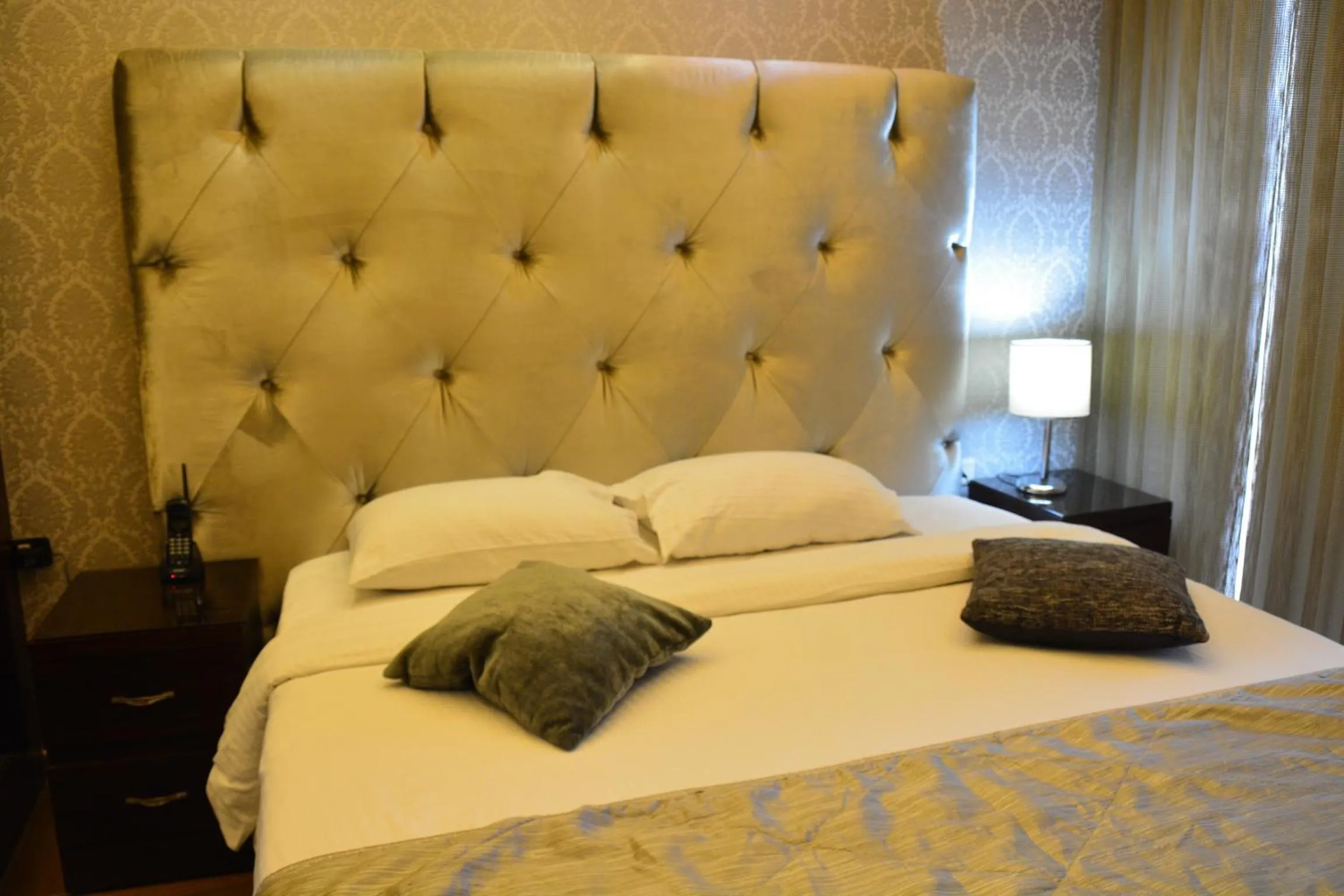 Bedroom, Bed in Nadine Hotel Suites