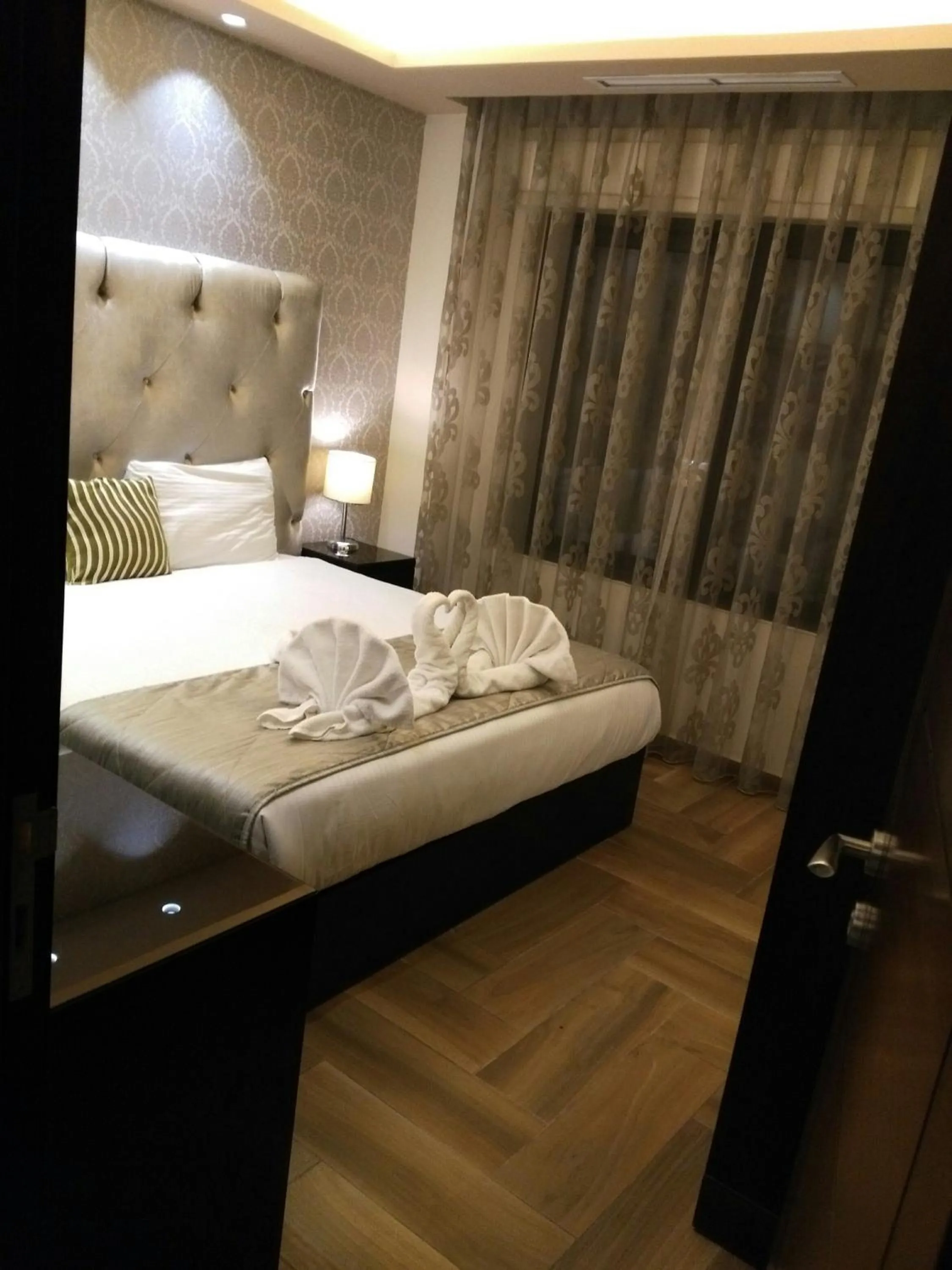 Bedroom, Bed in Nadine Hotel Suites