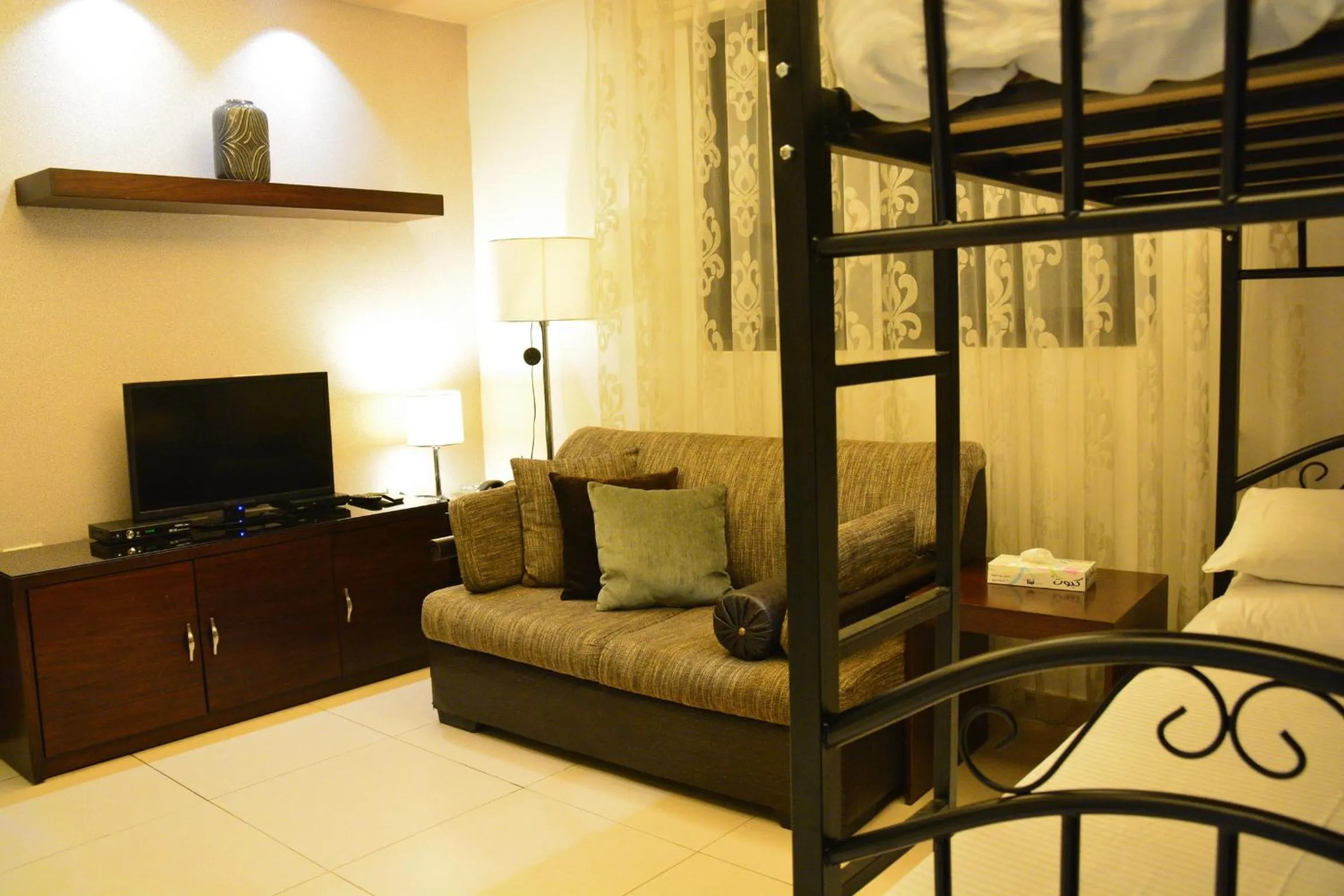 TV and multimedia, Bed in Nadine Hotel Suites