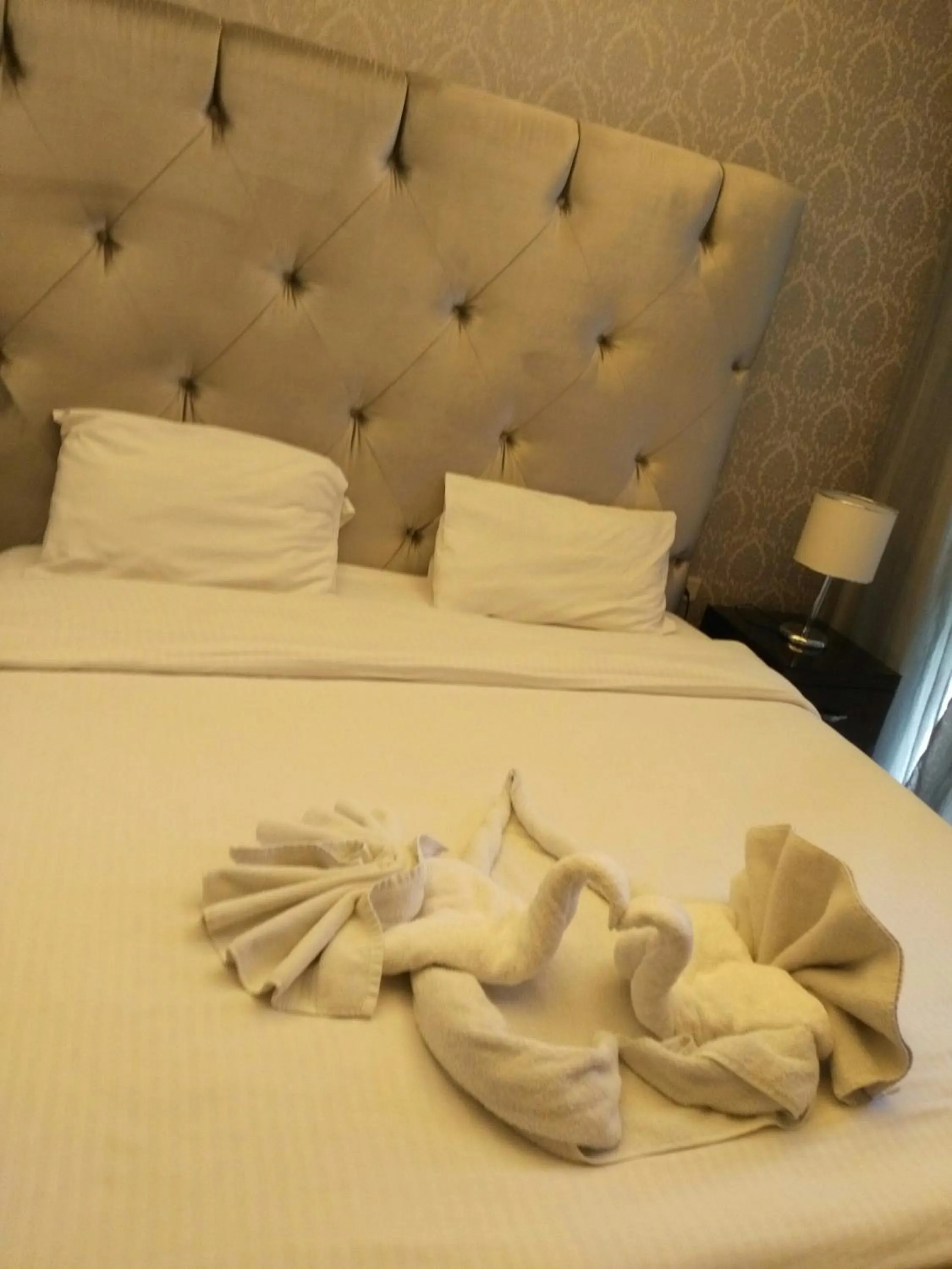Bedroom, Bed in Nadine Hotel Suites