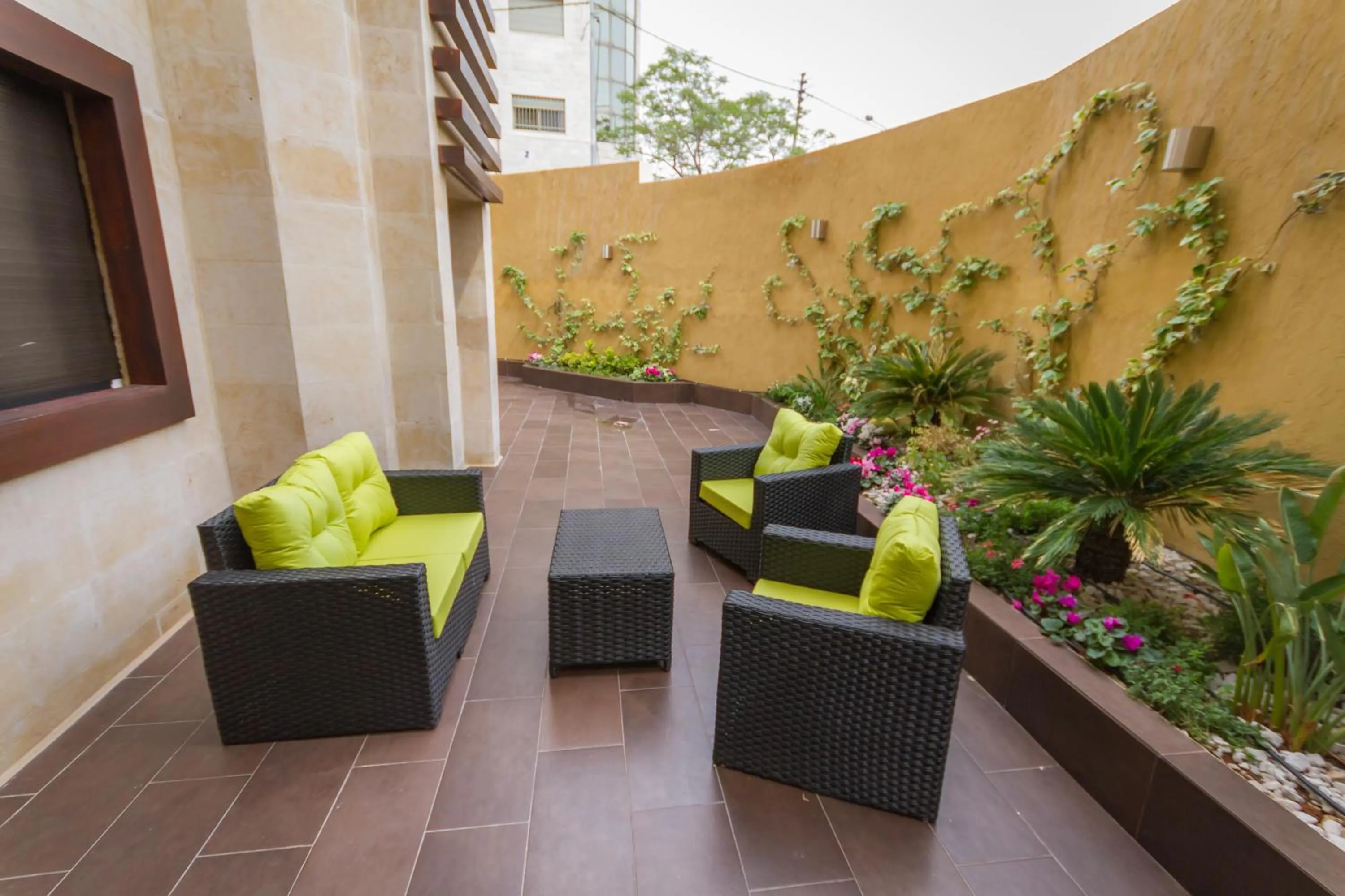 Garden in Nadine Hotel Suites